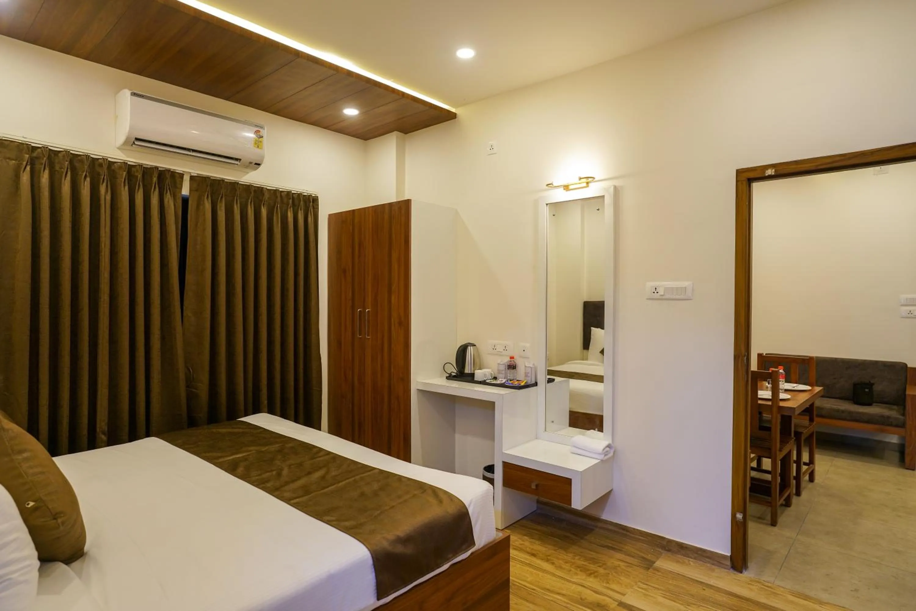 Bed in Grand Plaza Inn