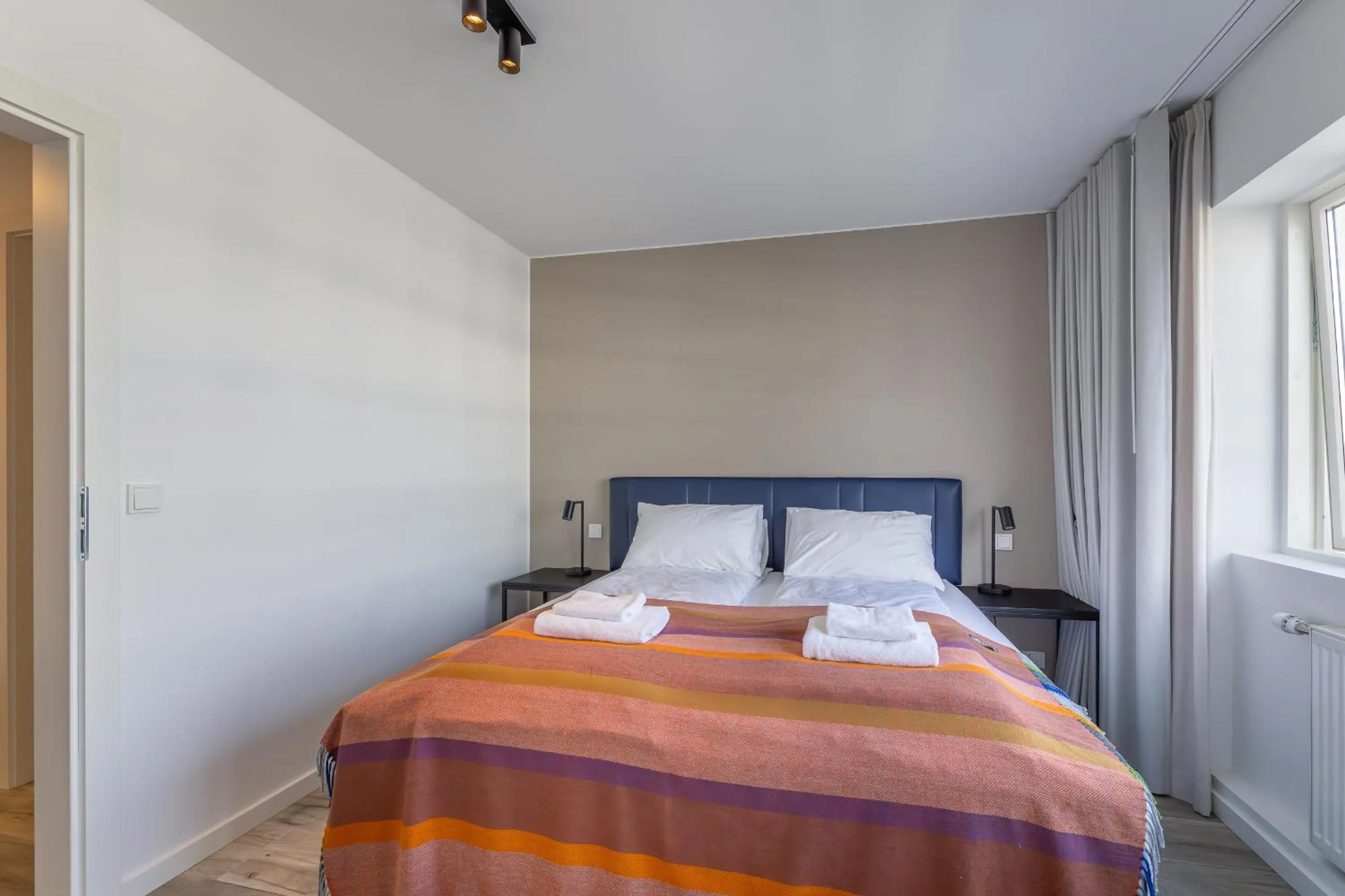 Bed in Hlemmur Suites