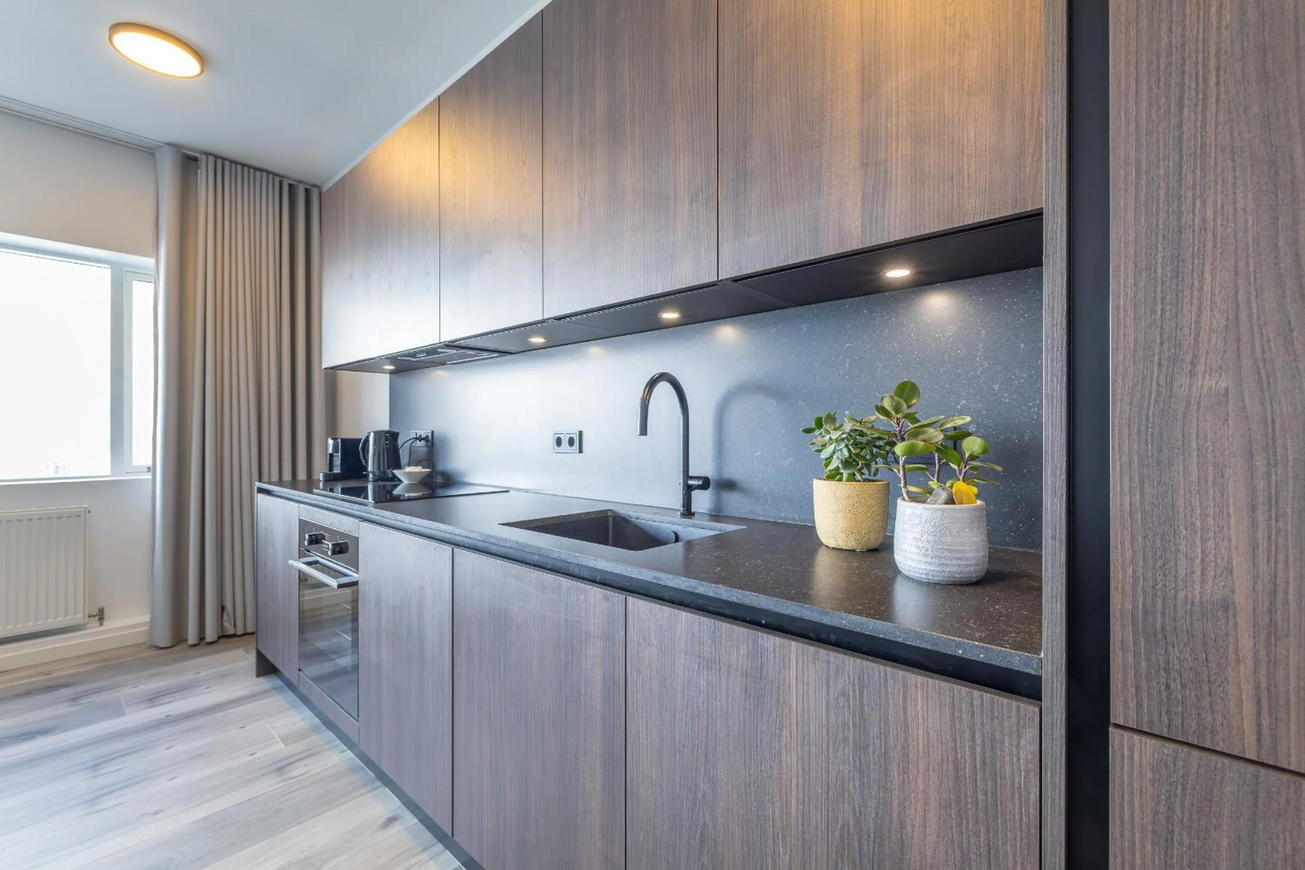 kitchen in Hlemmur Suites