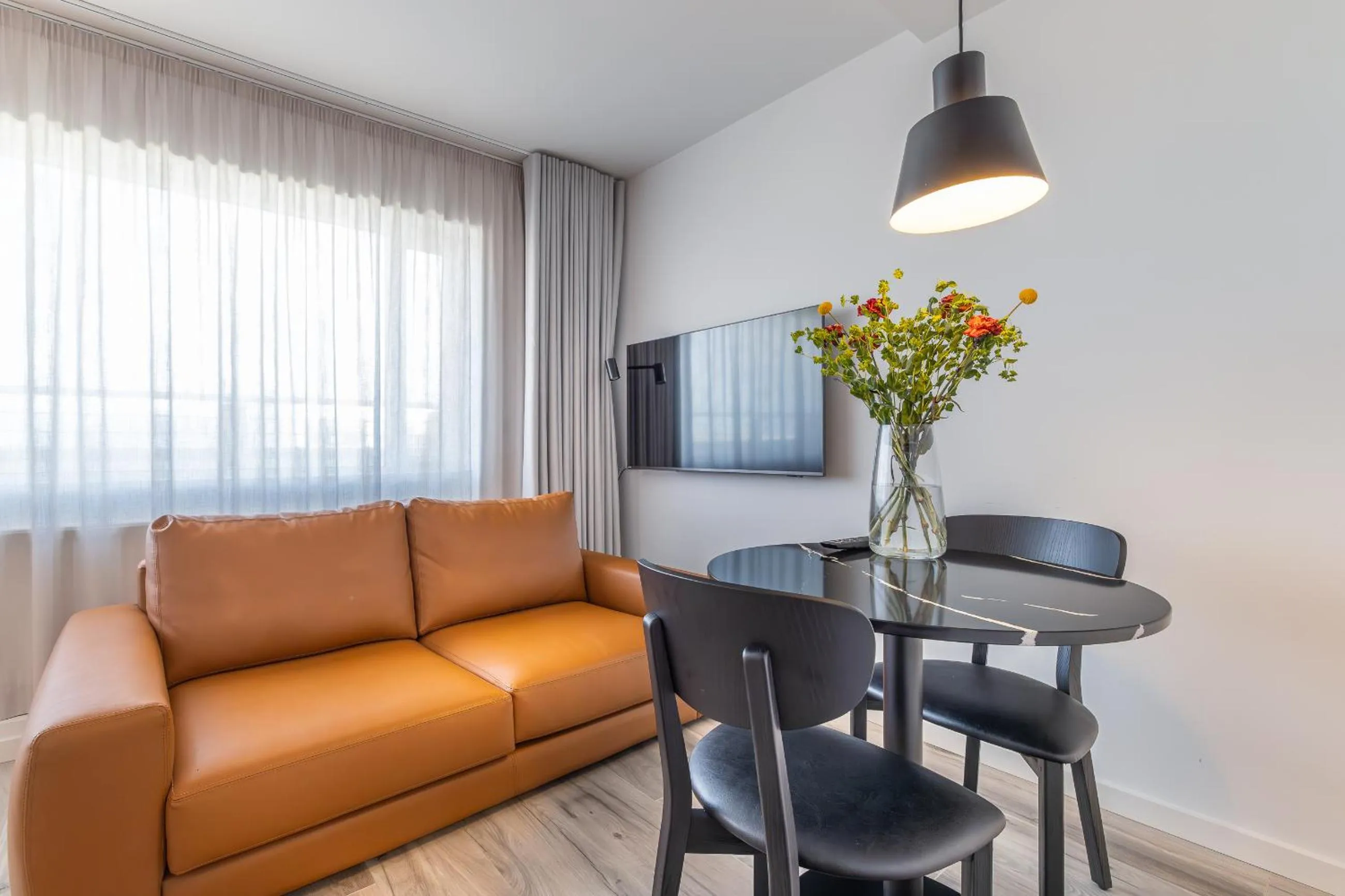 Living room in Hlemmur Suites