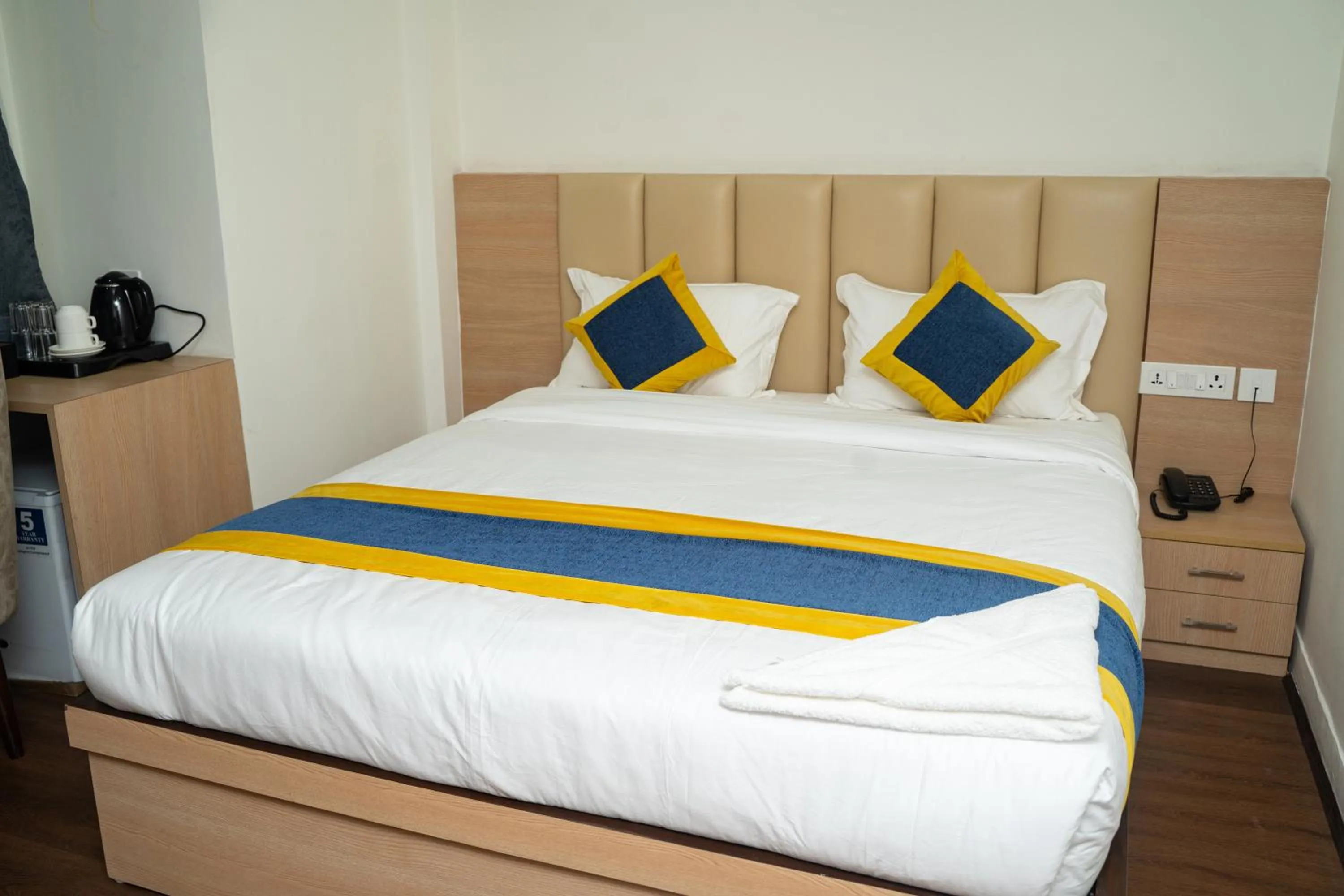 Bed in Hotel Mustang Holiday Inn