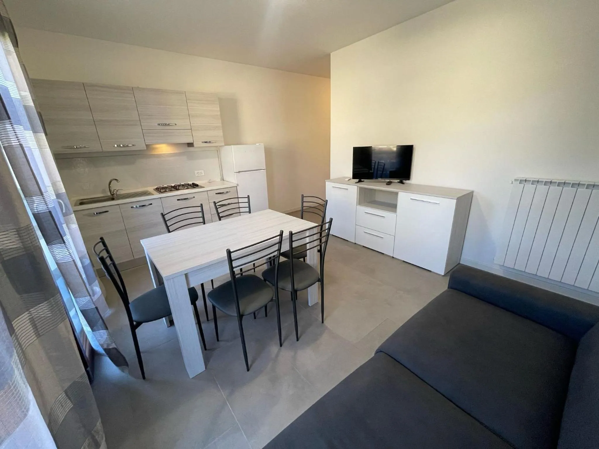 Kitchen or kitchenette in Residence Le Piramidi - Agenzia Cocal