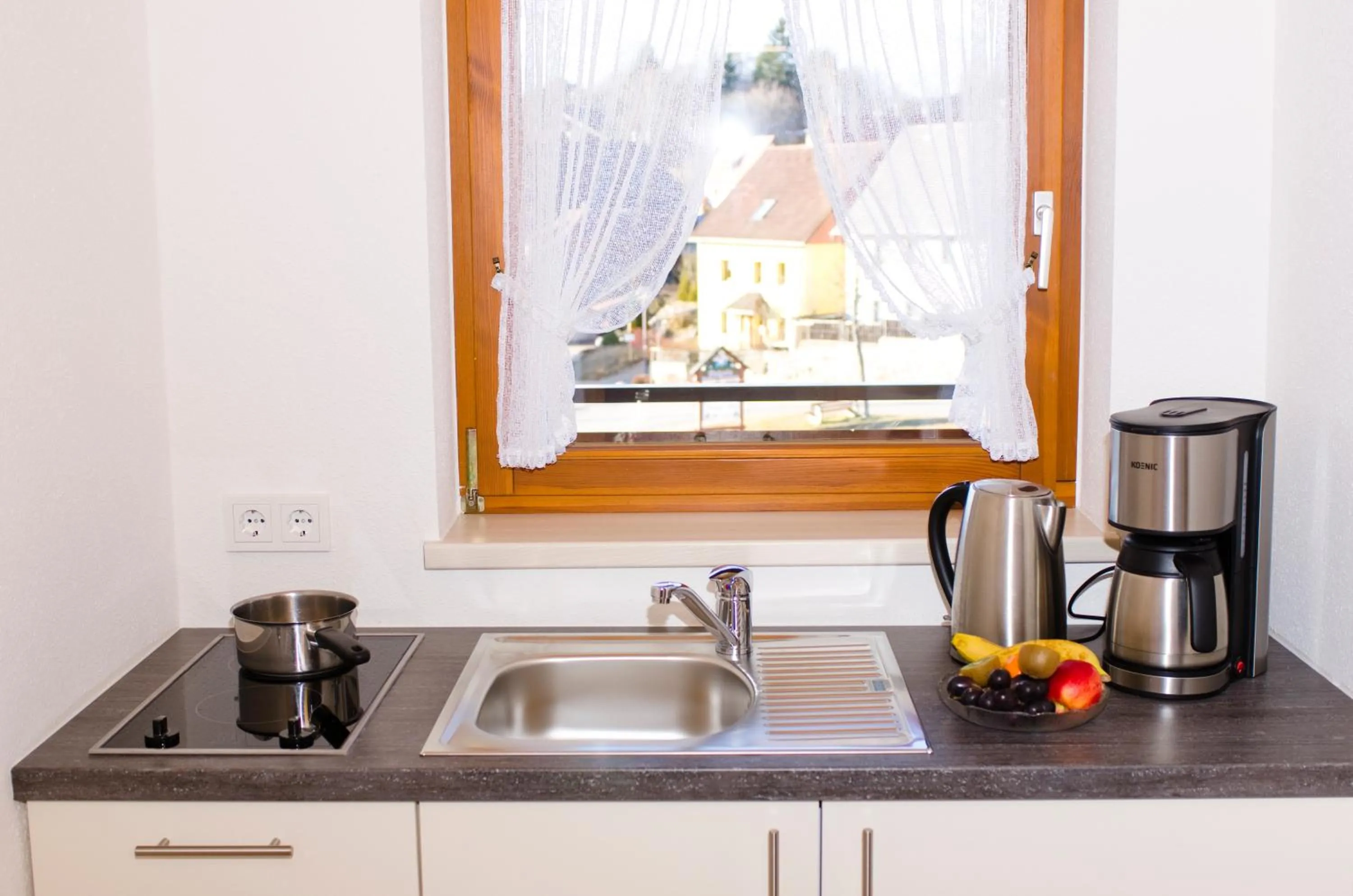 Kitchen or kitchenette in Schreyers Hotel Restaurant Mutzel