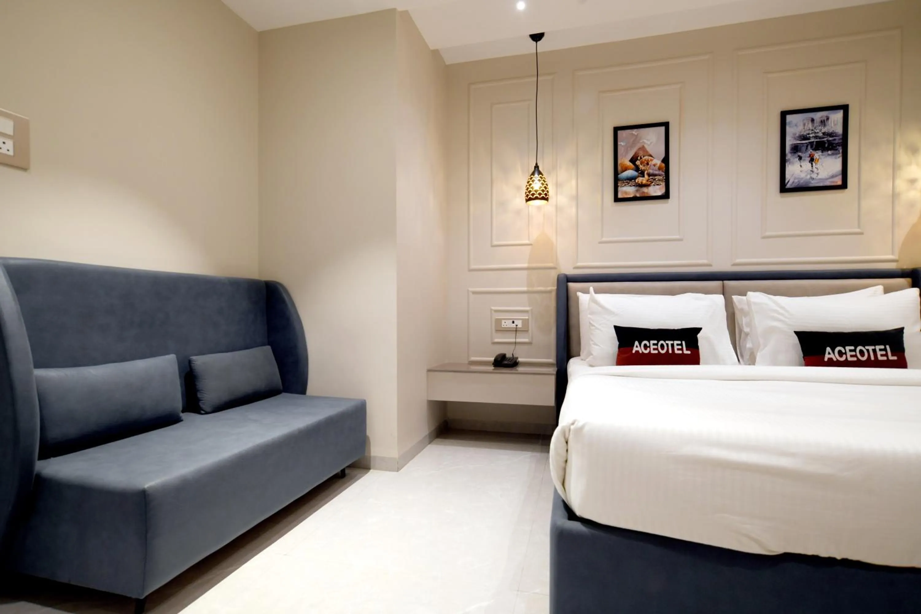 Living room, Bed in Aceotel Select Tulsi Vijay Nagar- A Luxury Boutique Hotel