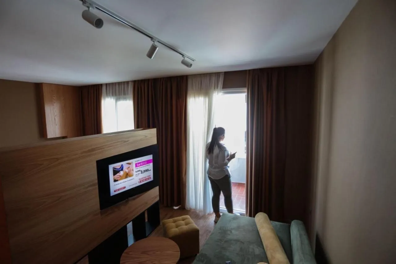 Bed in Alvin Comfort Hotel