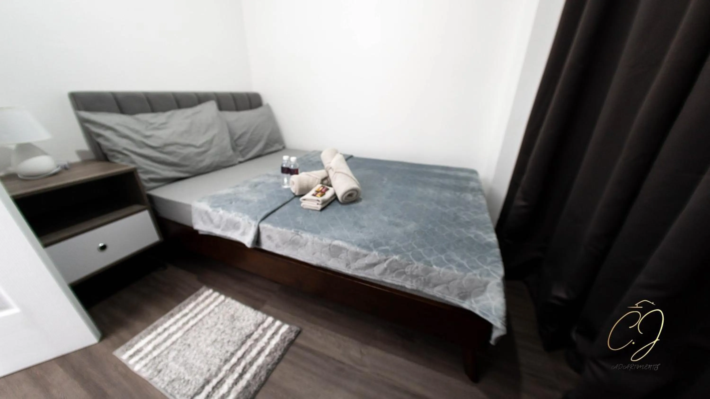 Bed in CJ Apartments