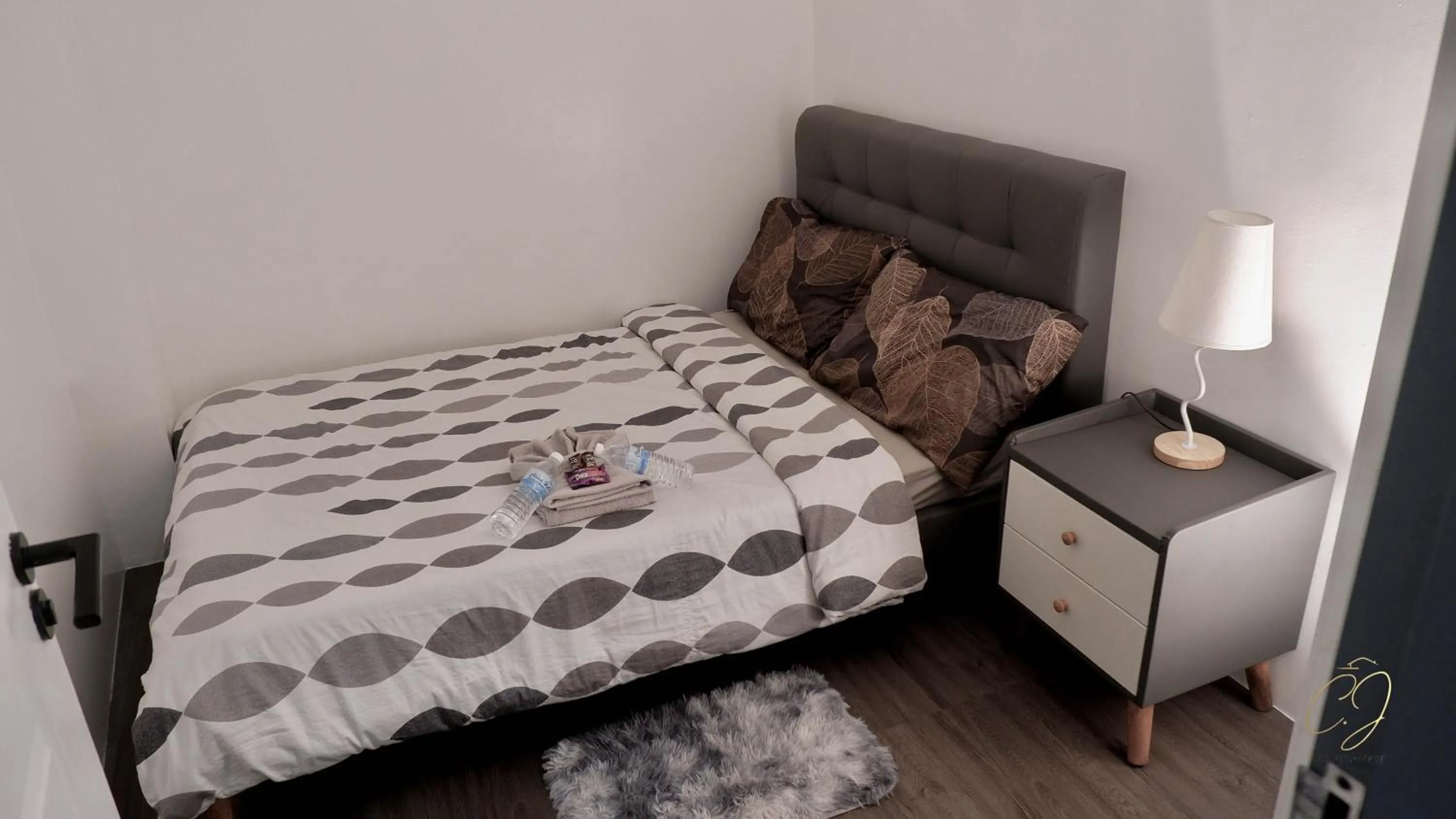 Bed in CJ Apartments