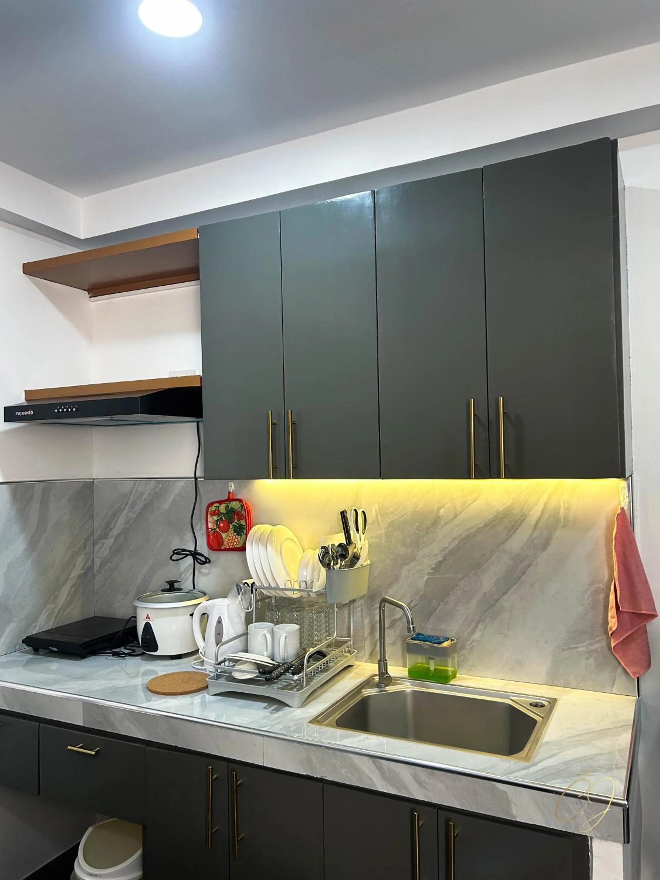 Kitchen or kitchenette in CJ Apartments