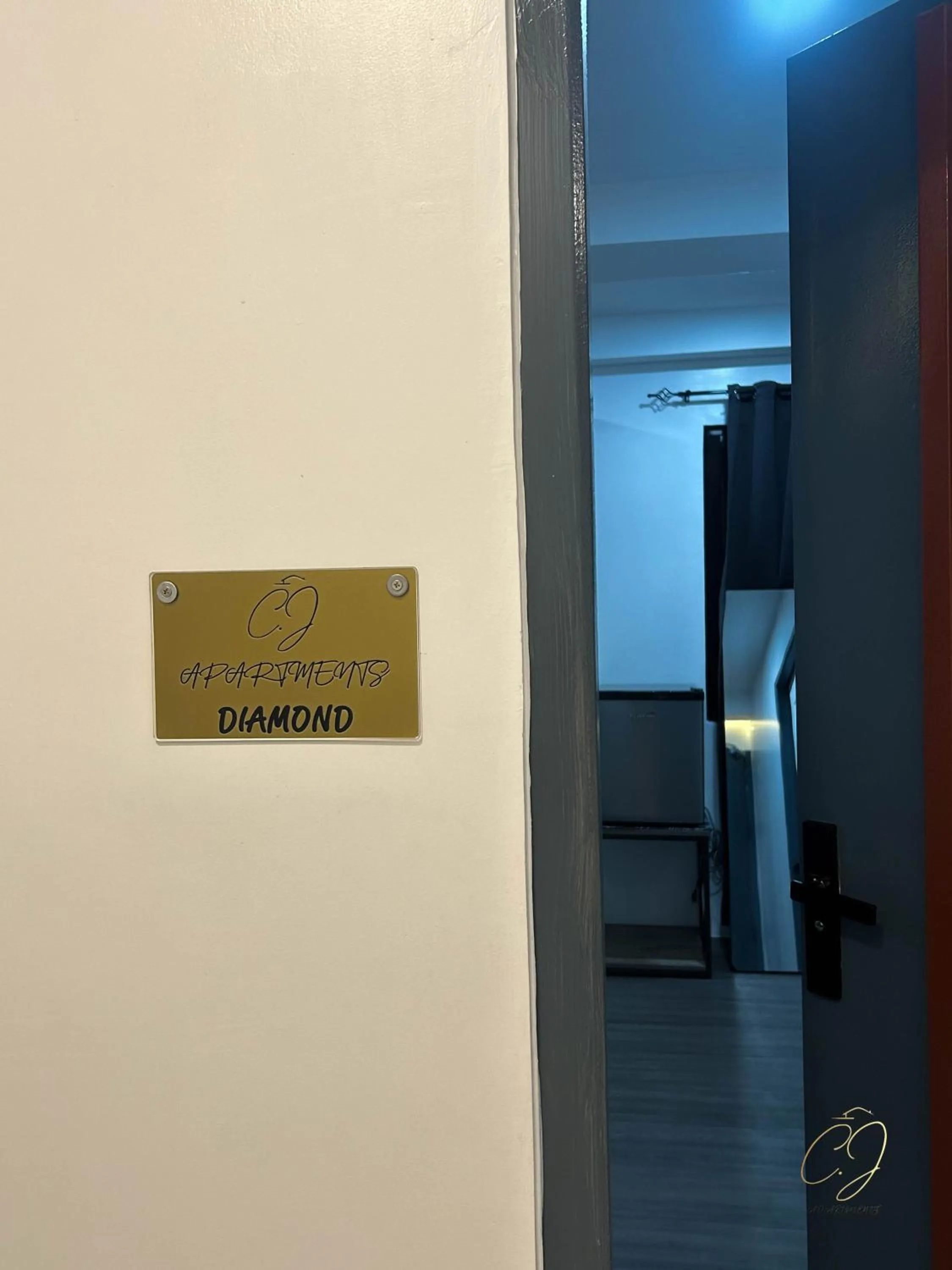 Property logo or sign in CJ Apartments