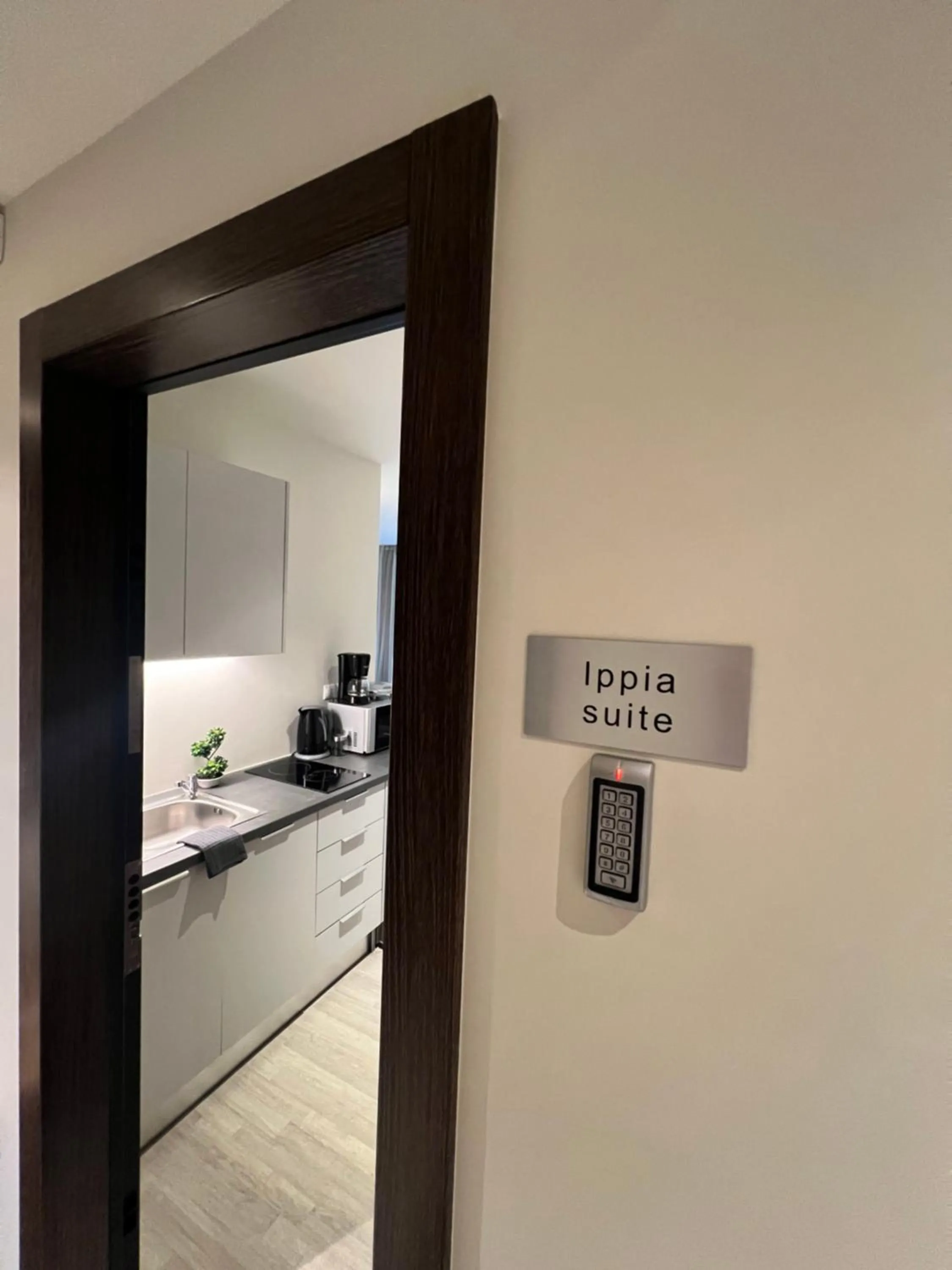 Property logo or sign in Athenian Retreat Penthouses