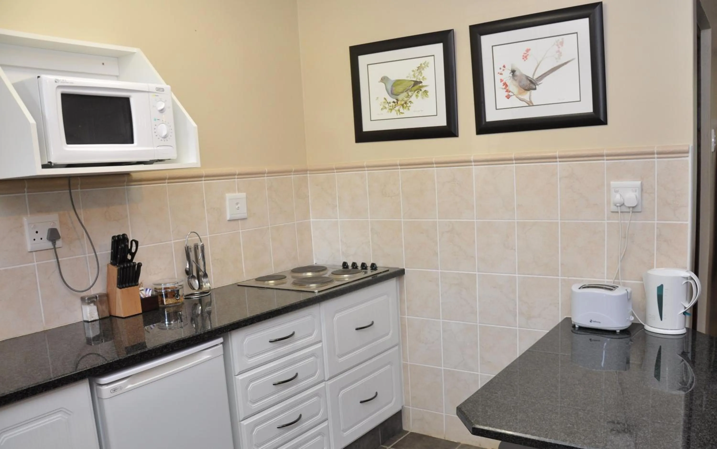 Kitchen or kitchenette in Birds of Paradise B&B