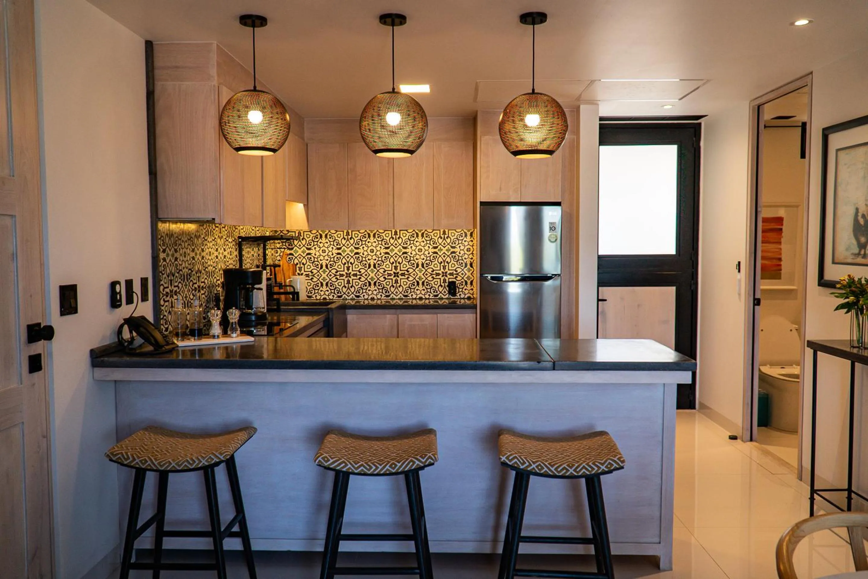 Kitchen or kitchenette in Flamboyan Hotel & Residences