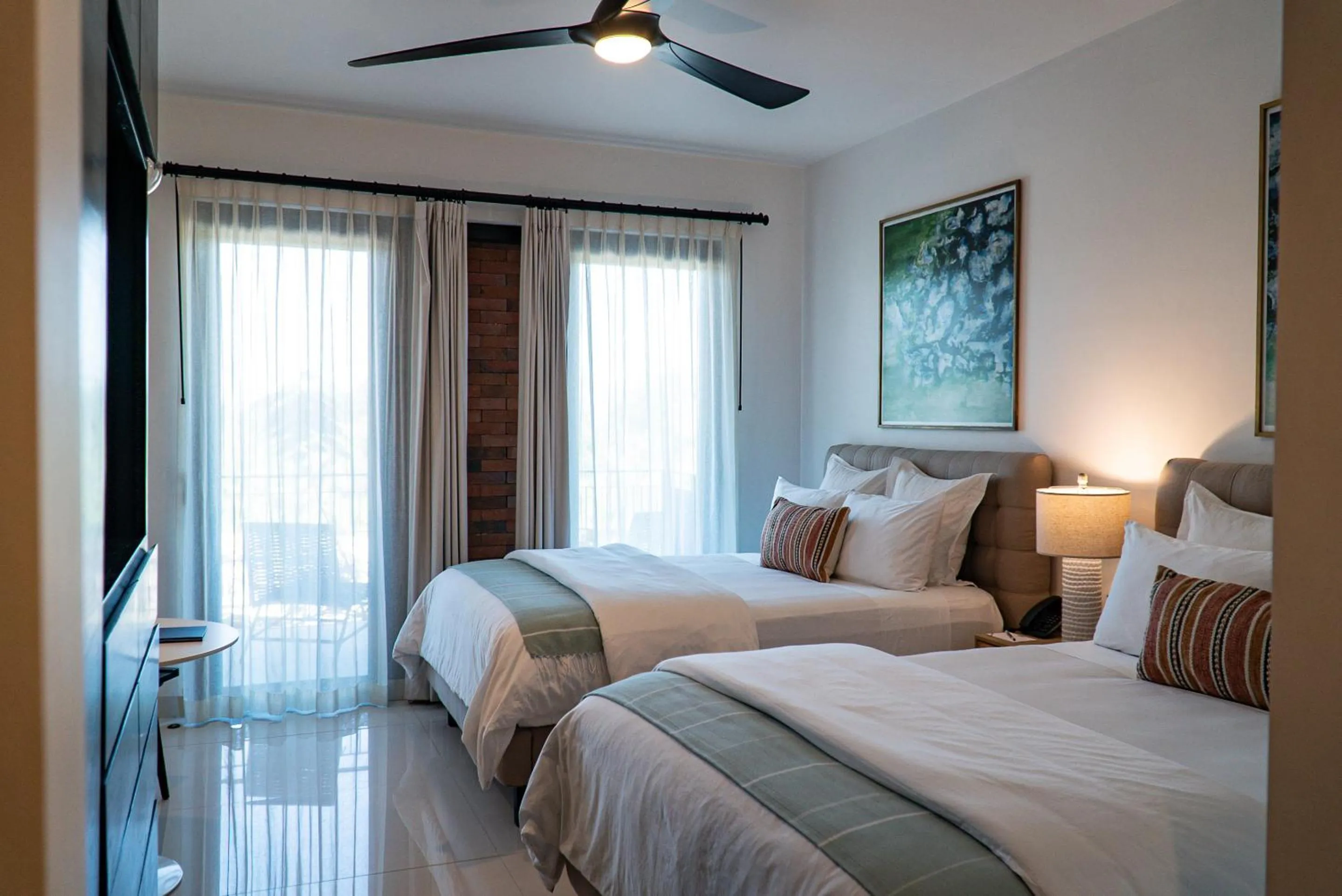 Bed in Flamboyan Hotel & Residences