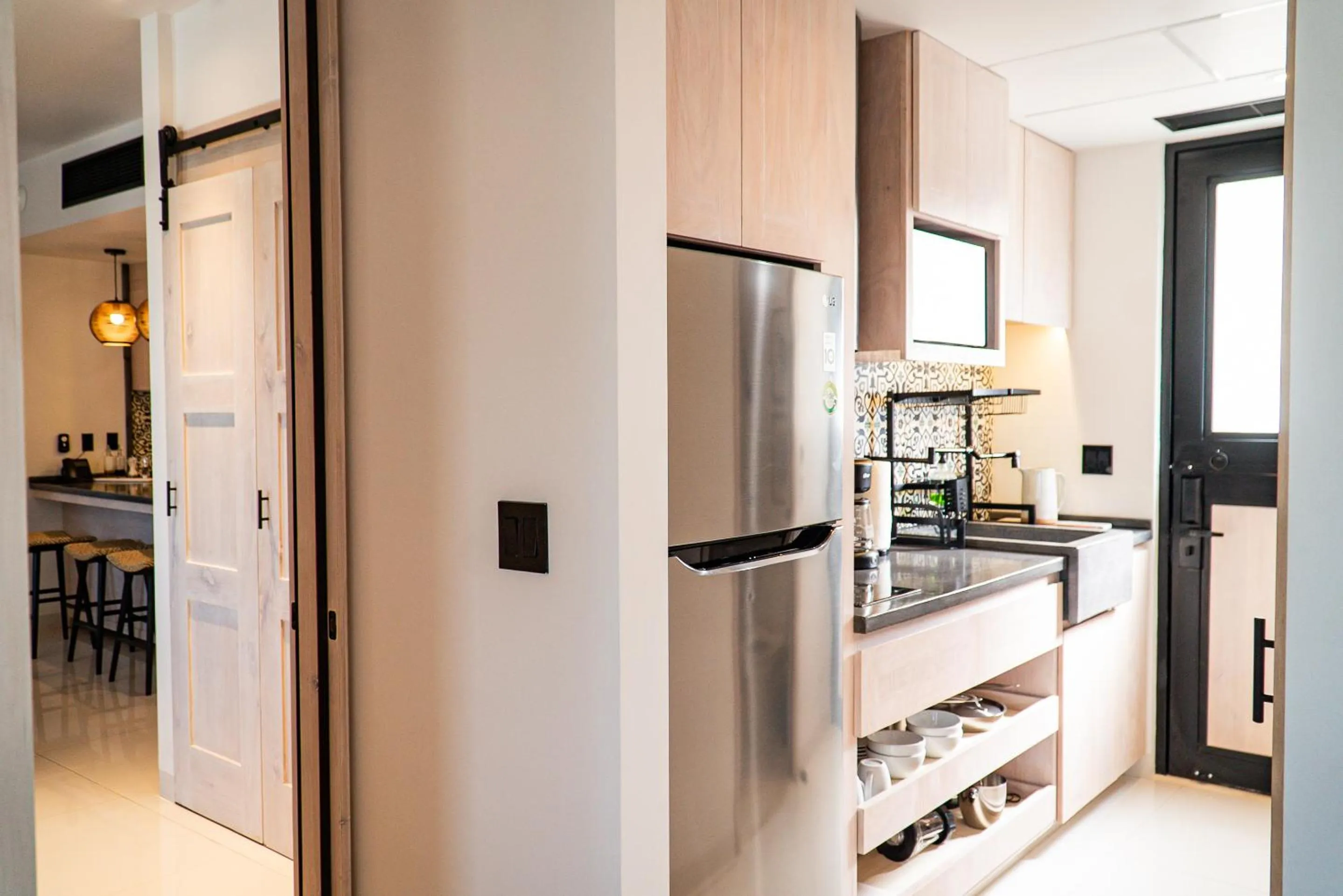 Kitchen or kitchenette in Flamboyan Hotel & Residences