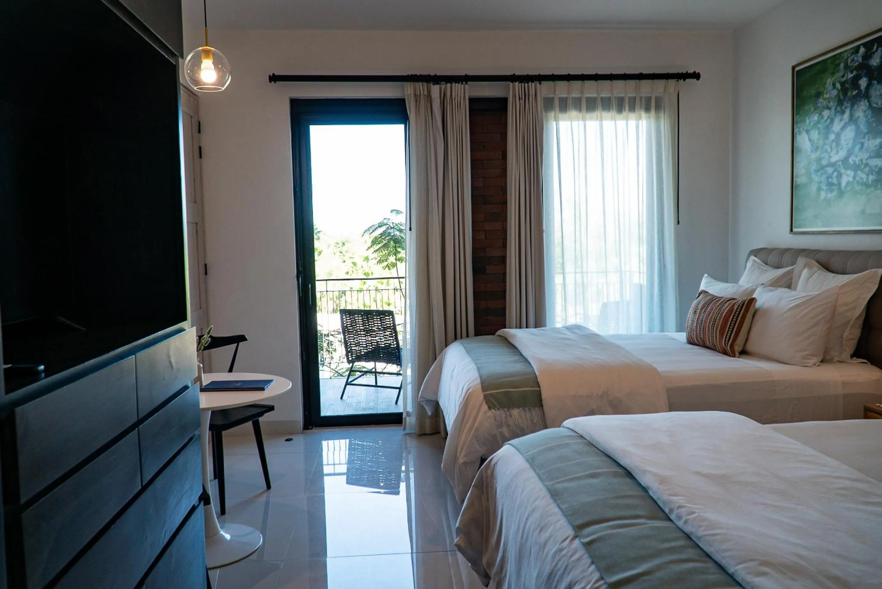 Bed in Flamboyan Hotel & Residences