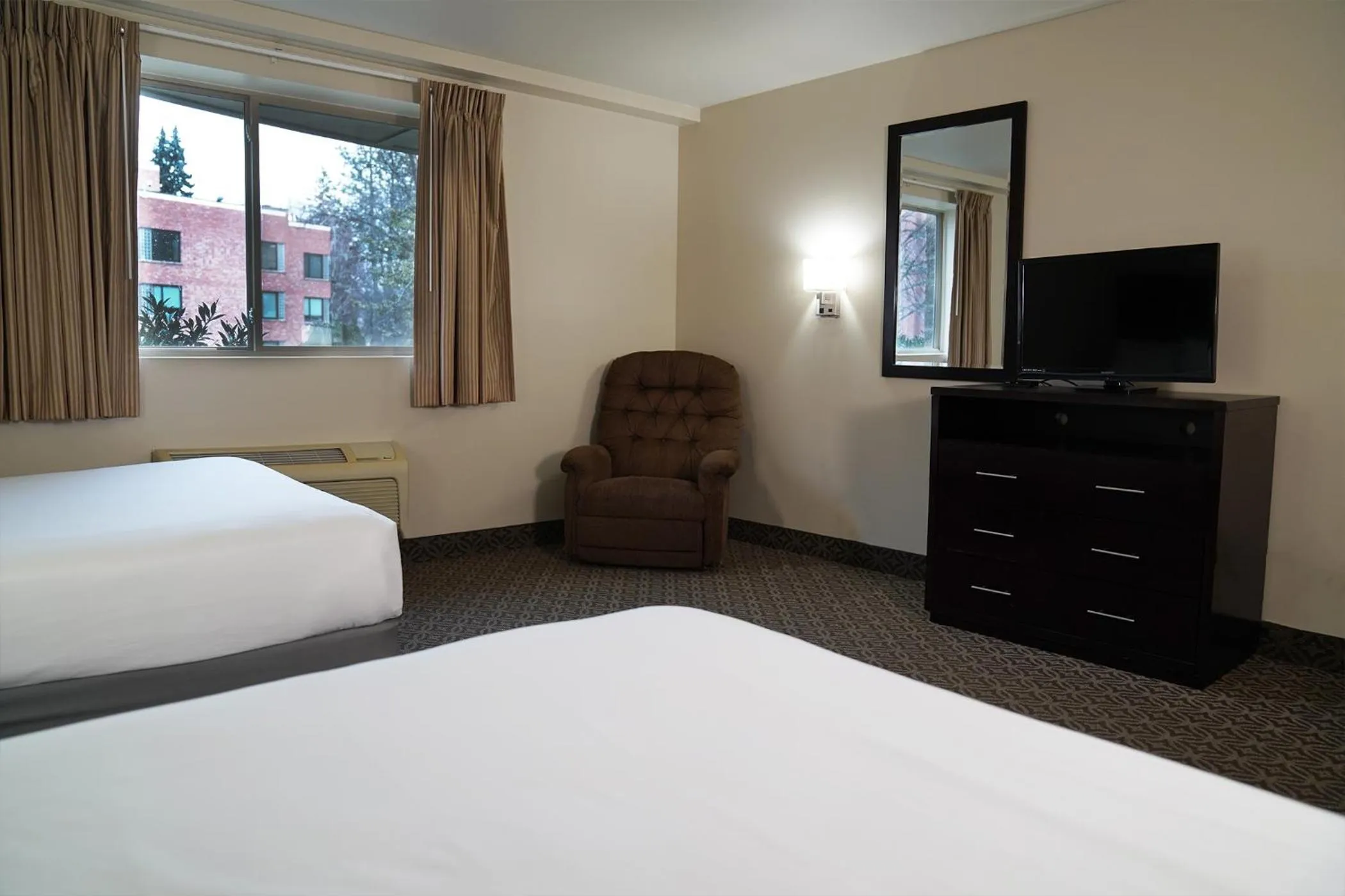 Bed in The Madison Inn