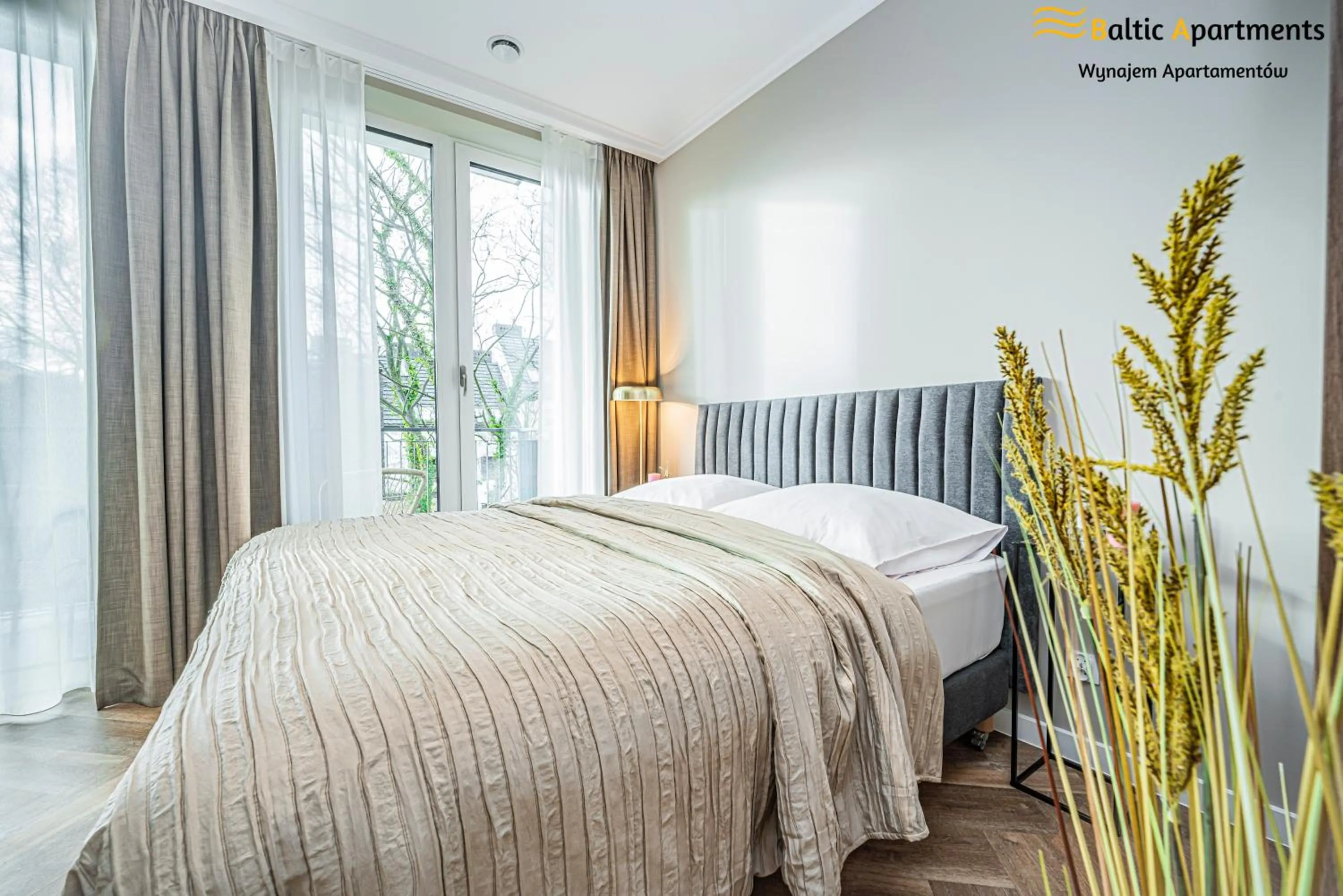 Bed in Seaside Garden Apartments & Wellness by Baltic Apartments