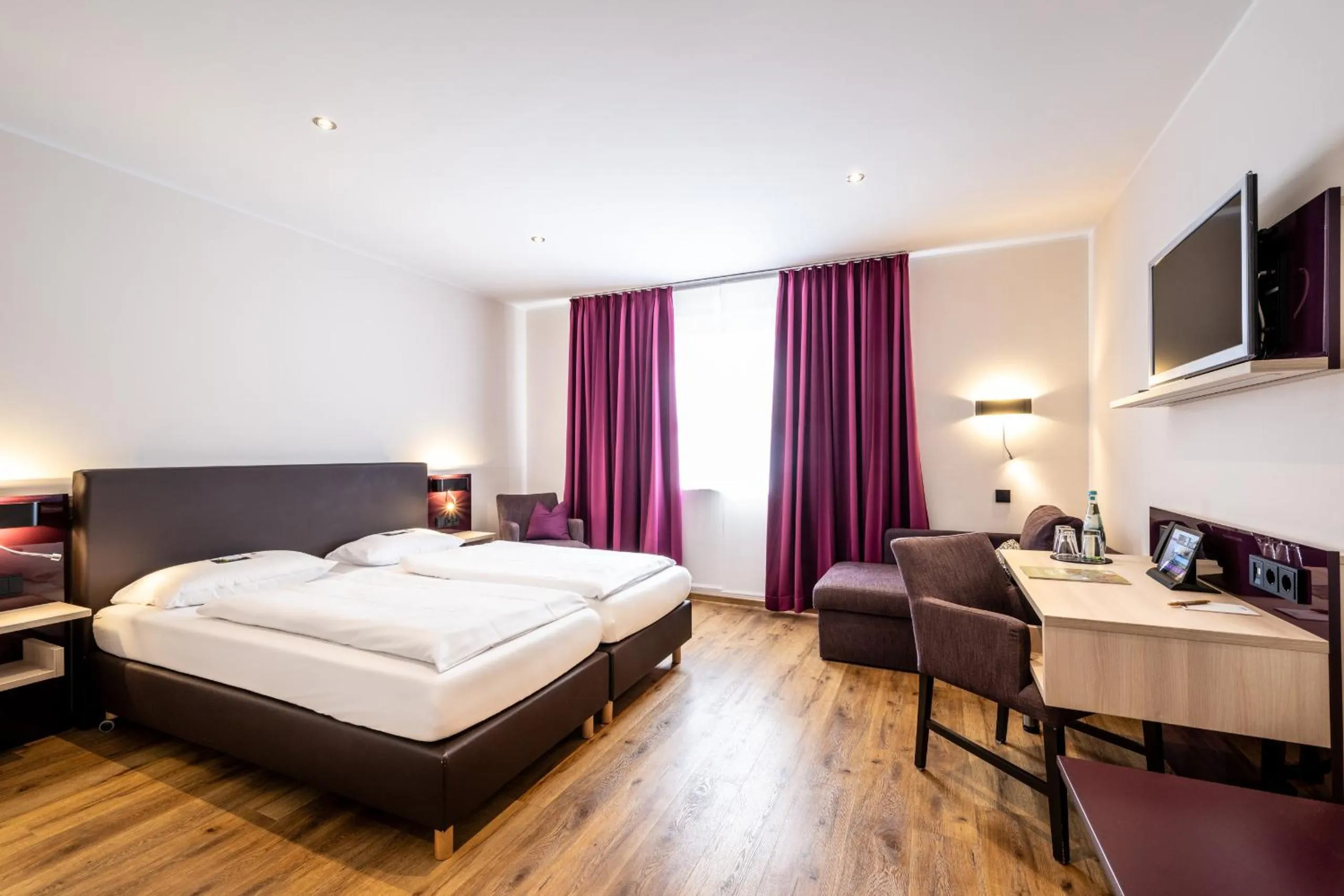 Photo of the whole room, Bed in Weinhotel Restaurant Klostermühle