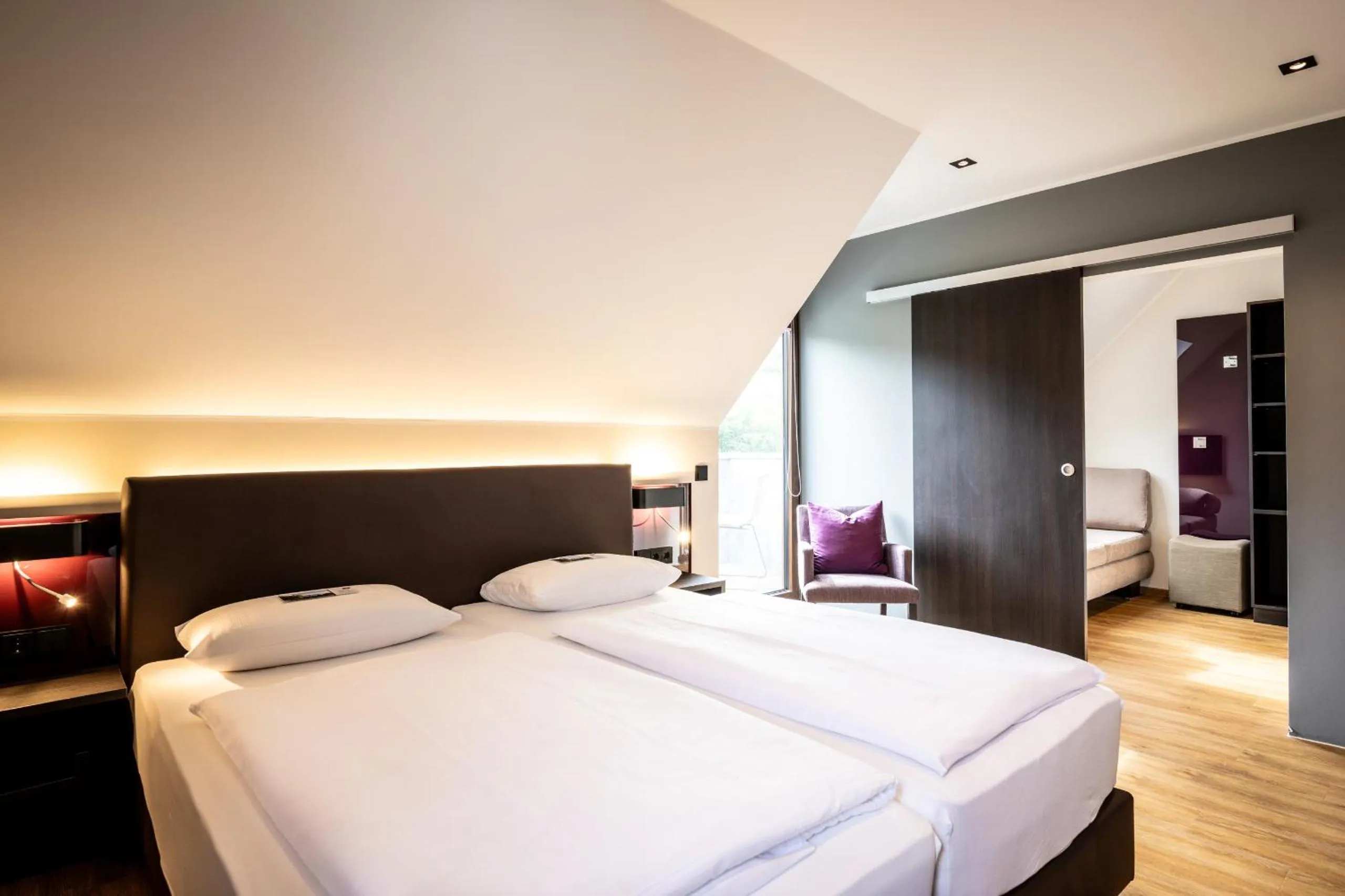 Photo of the whole room, Bed in Weinhotel Restaurant Klostermühle