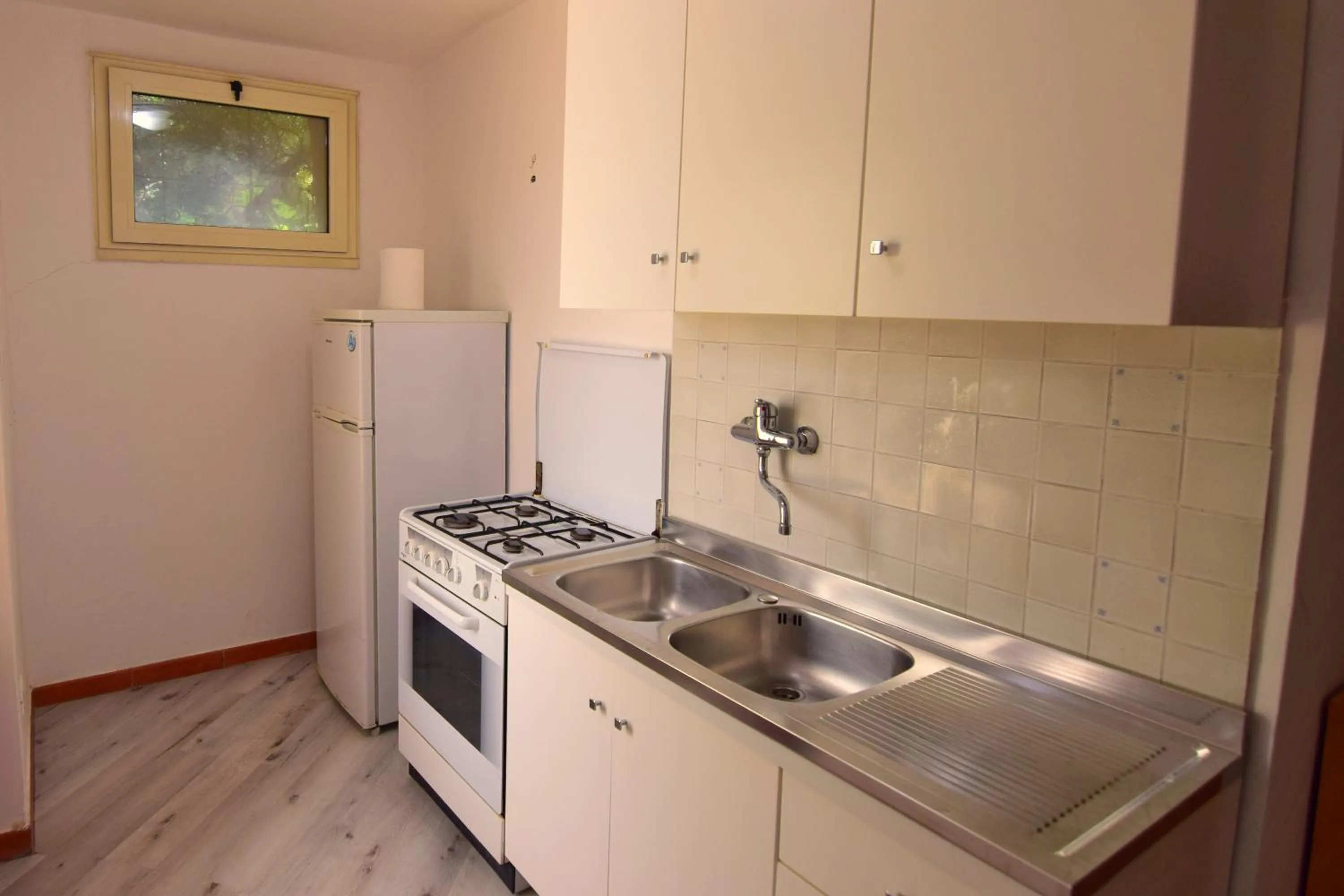 Kitchen or kitchenette in Un Ospite a Fontania