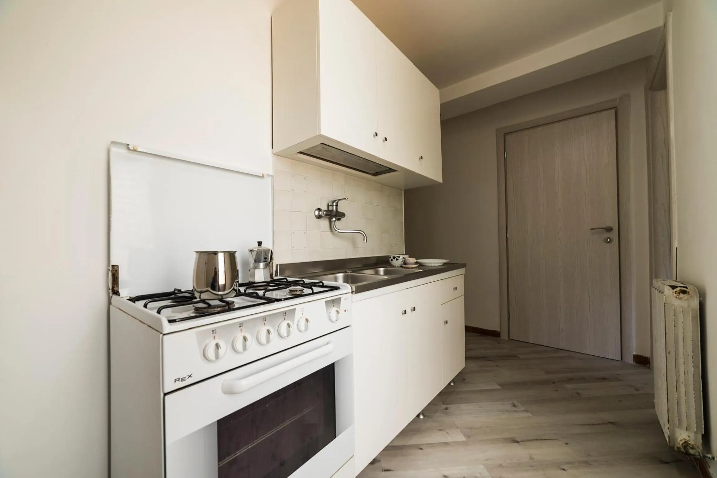 Kitchen or kitchenette in Un Ospite a Fontania
