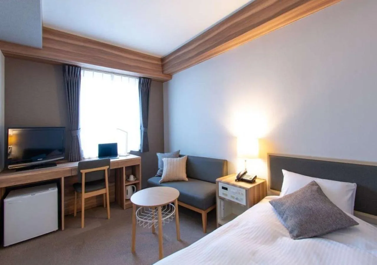 Photo of the whole room, Bed in Business Inn Norte