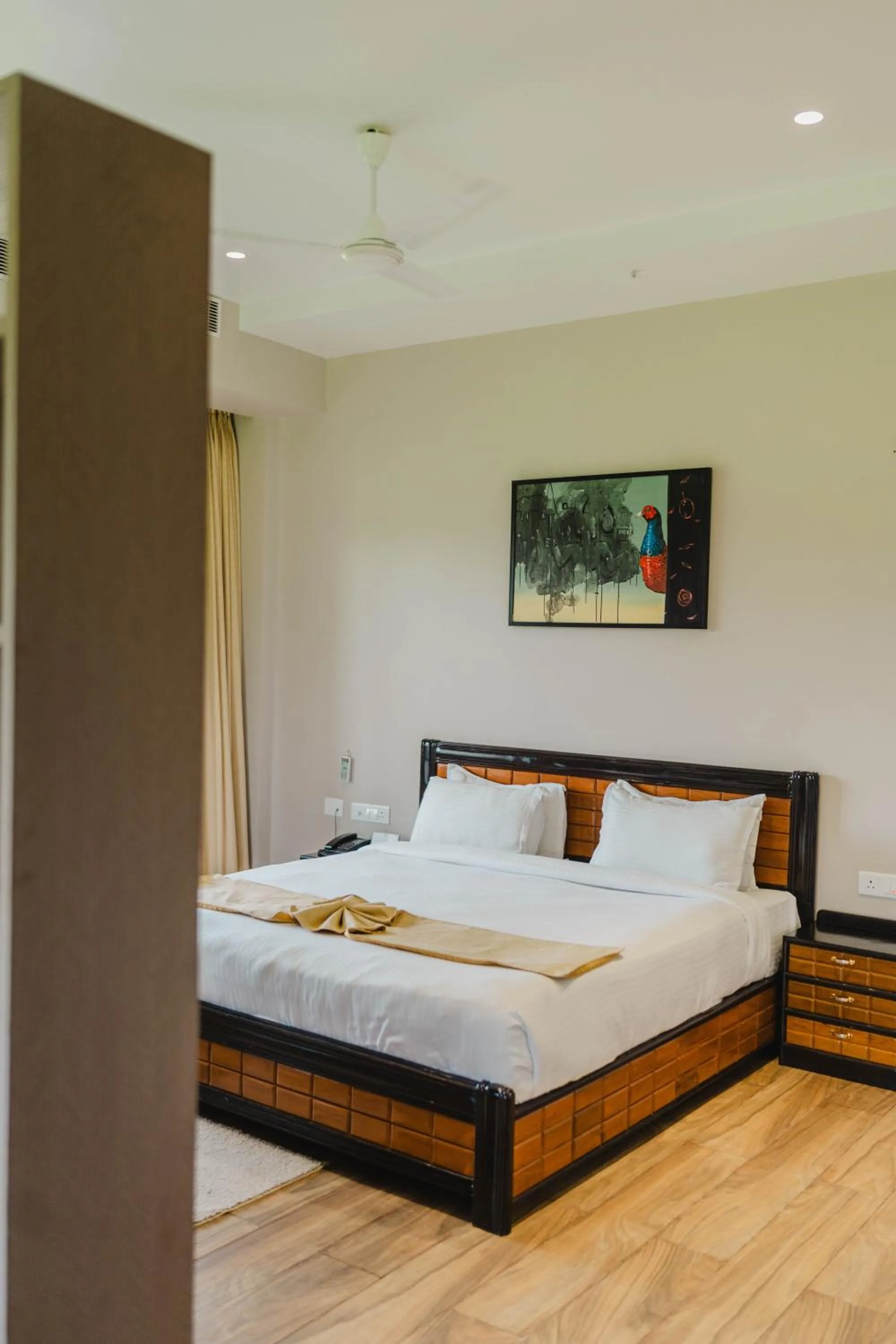 Bed in Finn's Weaver Resort, Kaziranga