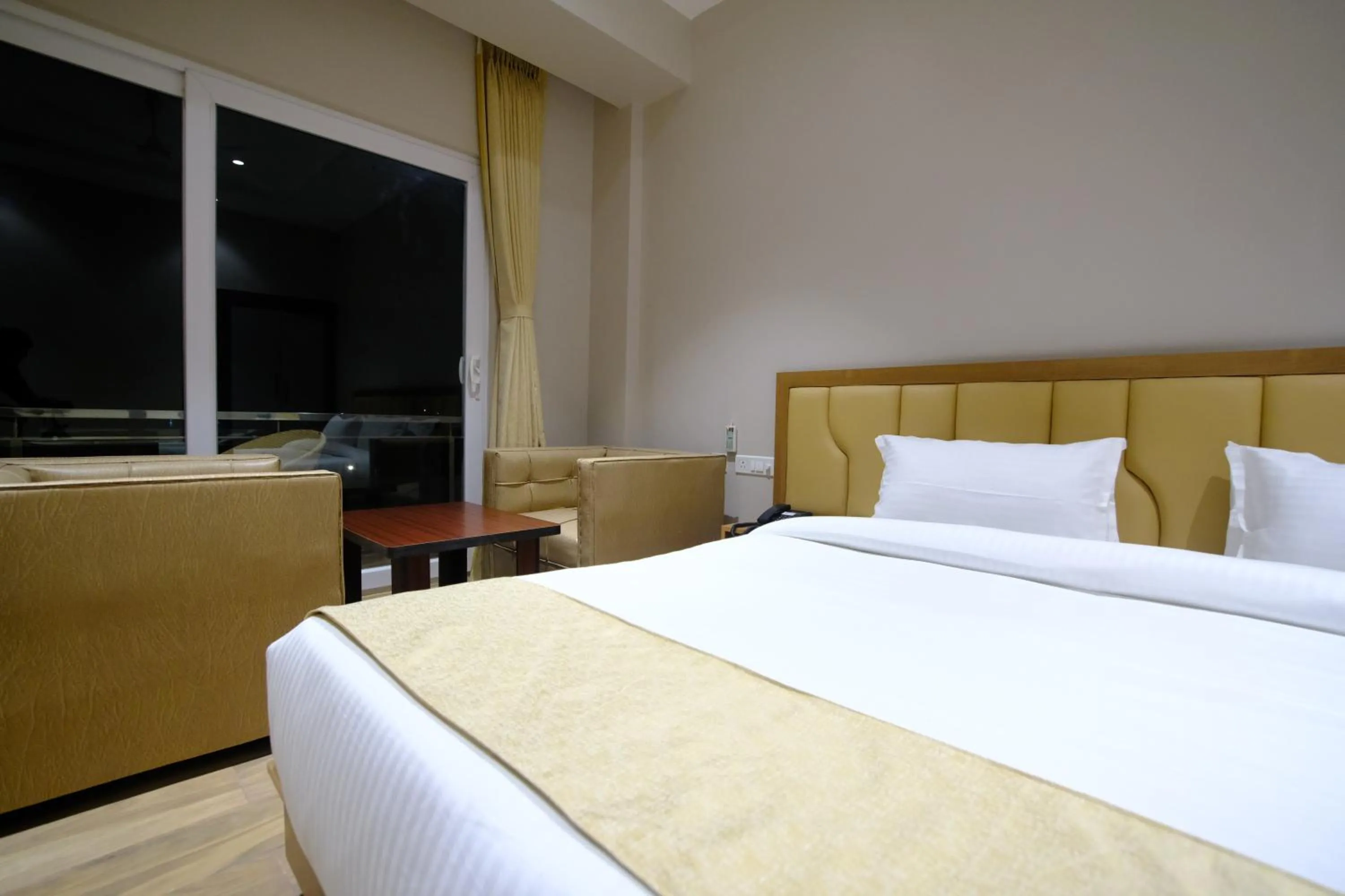 Bed in Finn's Weaver Resort, Kaziranga