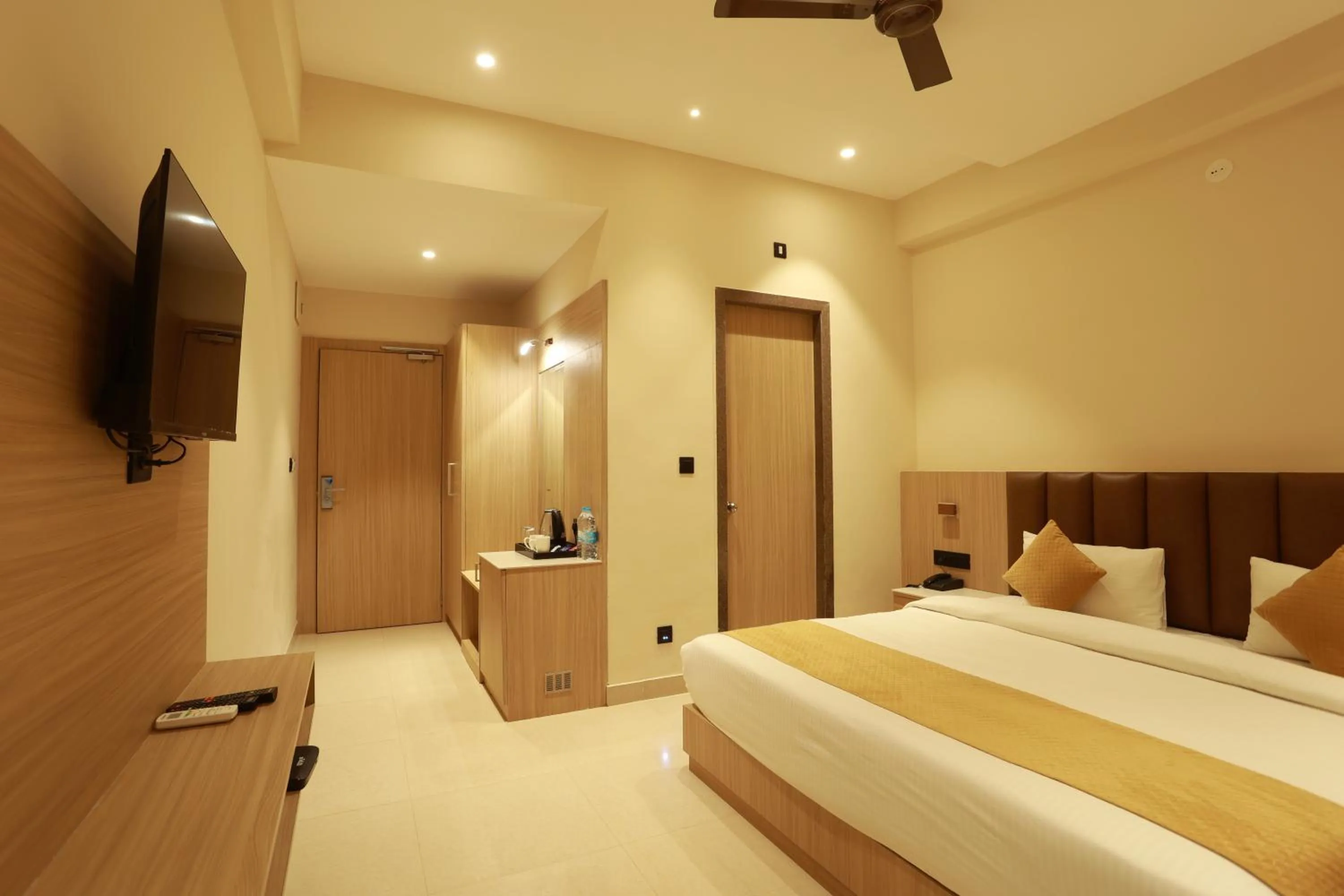 Bed in Hotel Taviral Regency