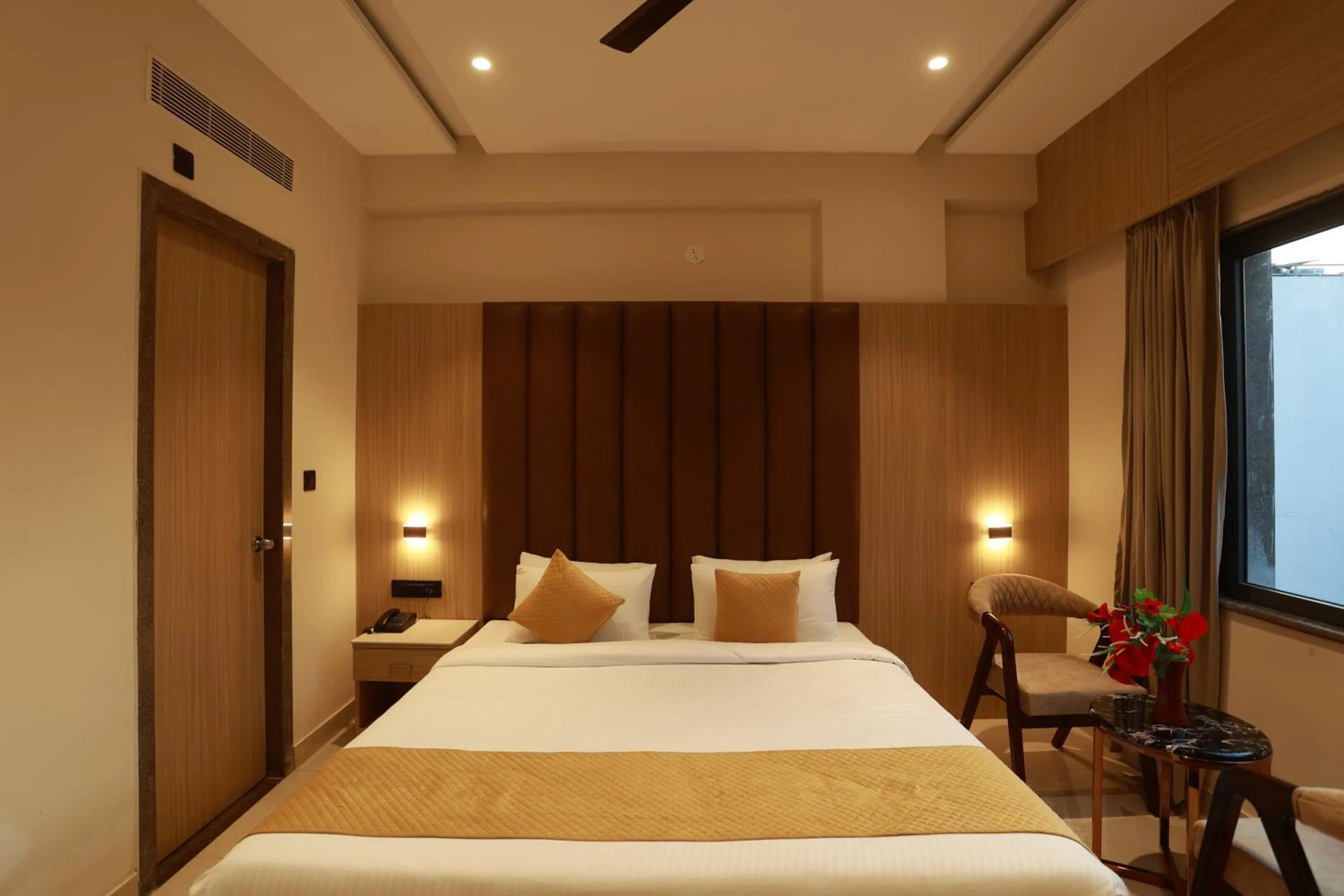 Bed in Hotel Taviral Regency