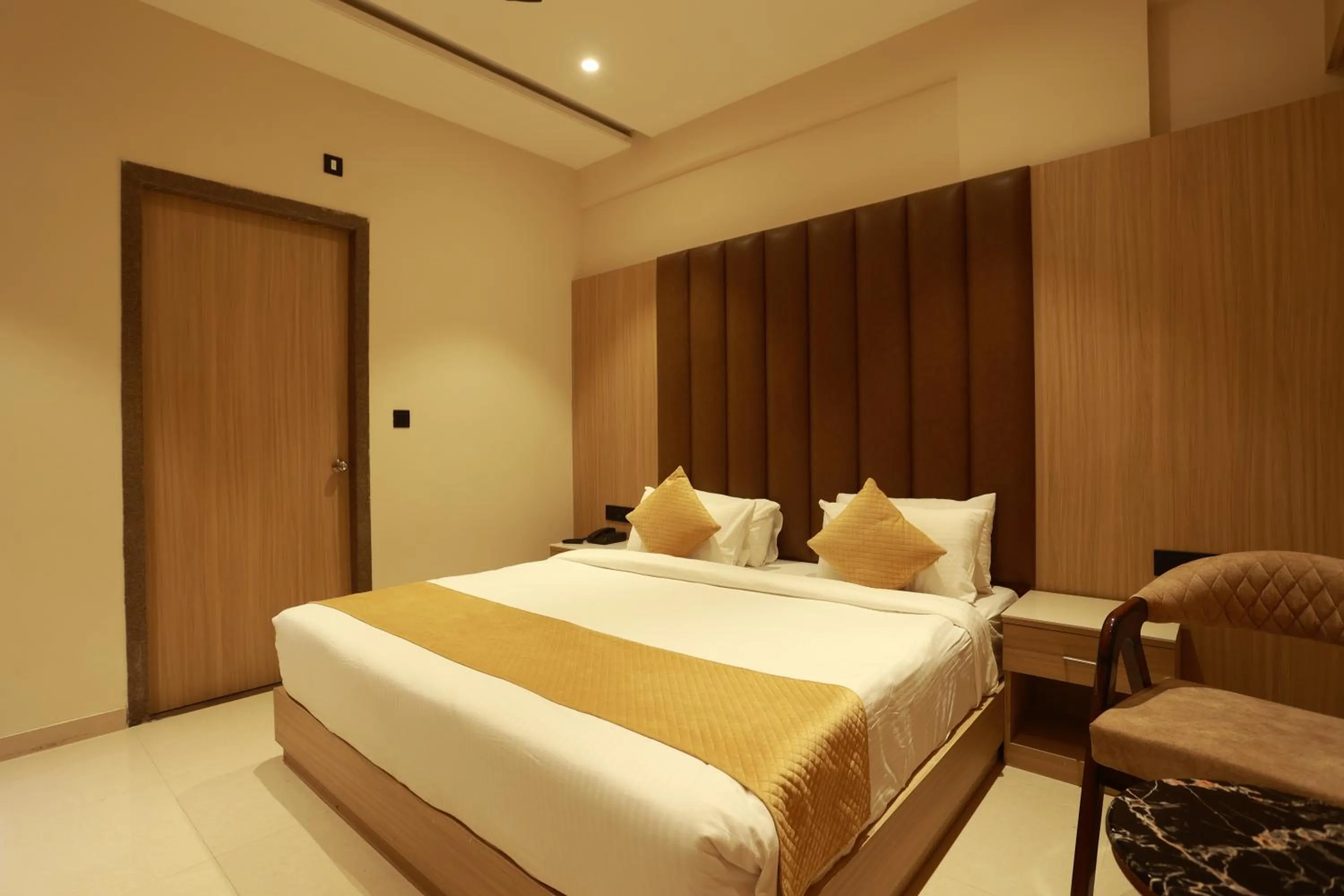 Bed in Hotel Taviral Regency