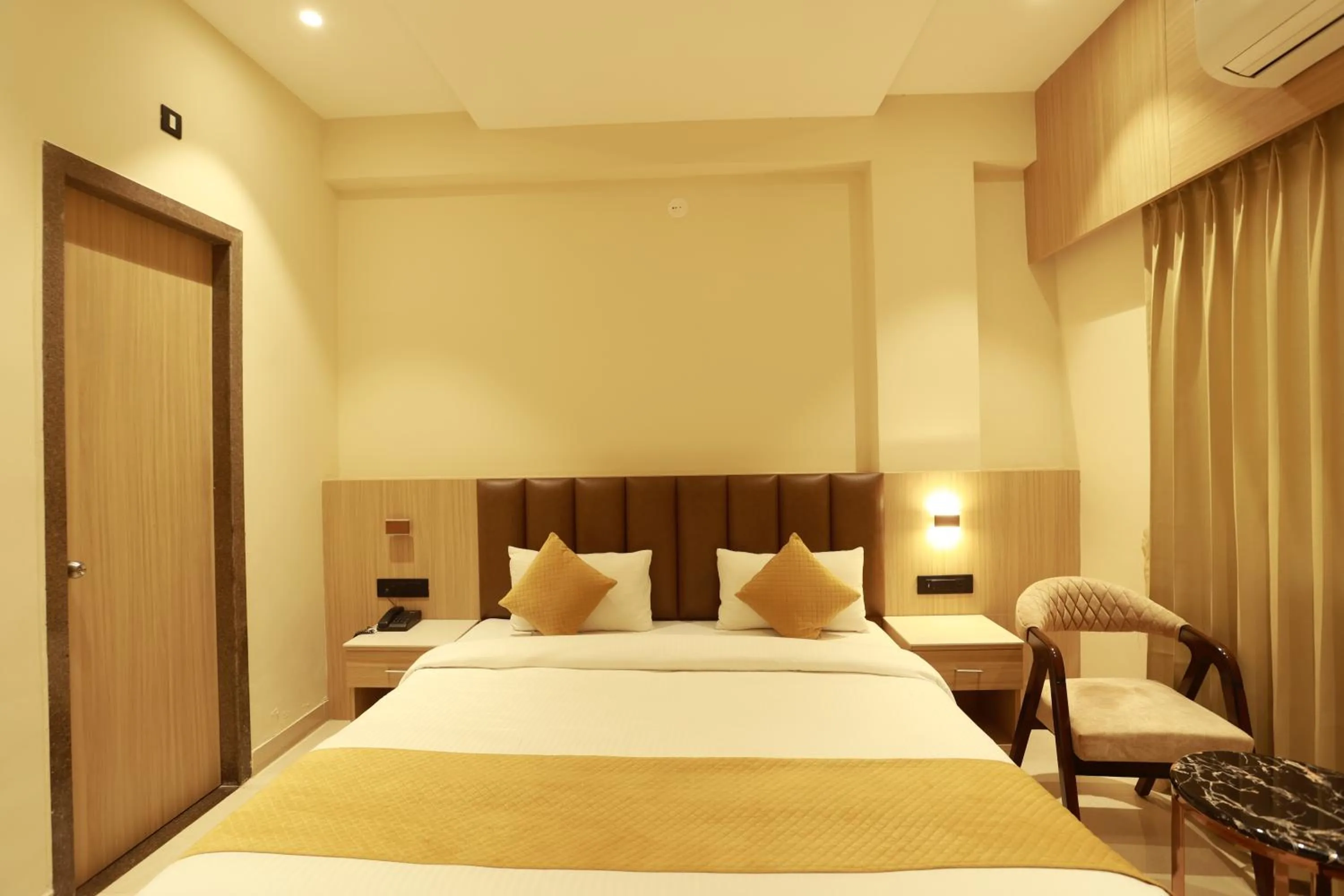 Bed in Hotel Taviral Regency