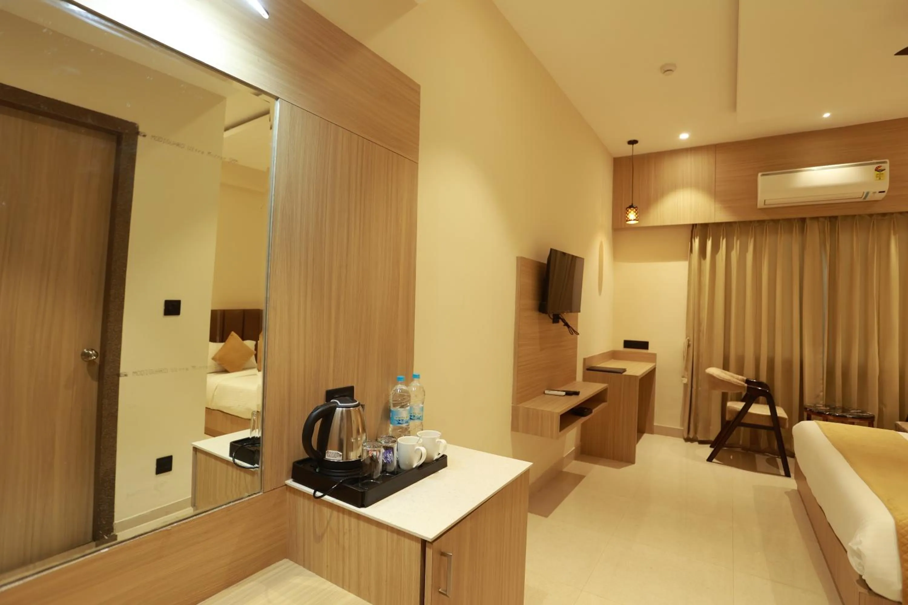 Bed in Hotel Taviral Regency