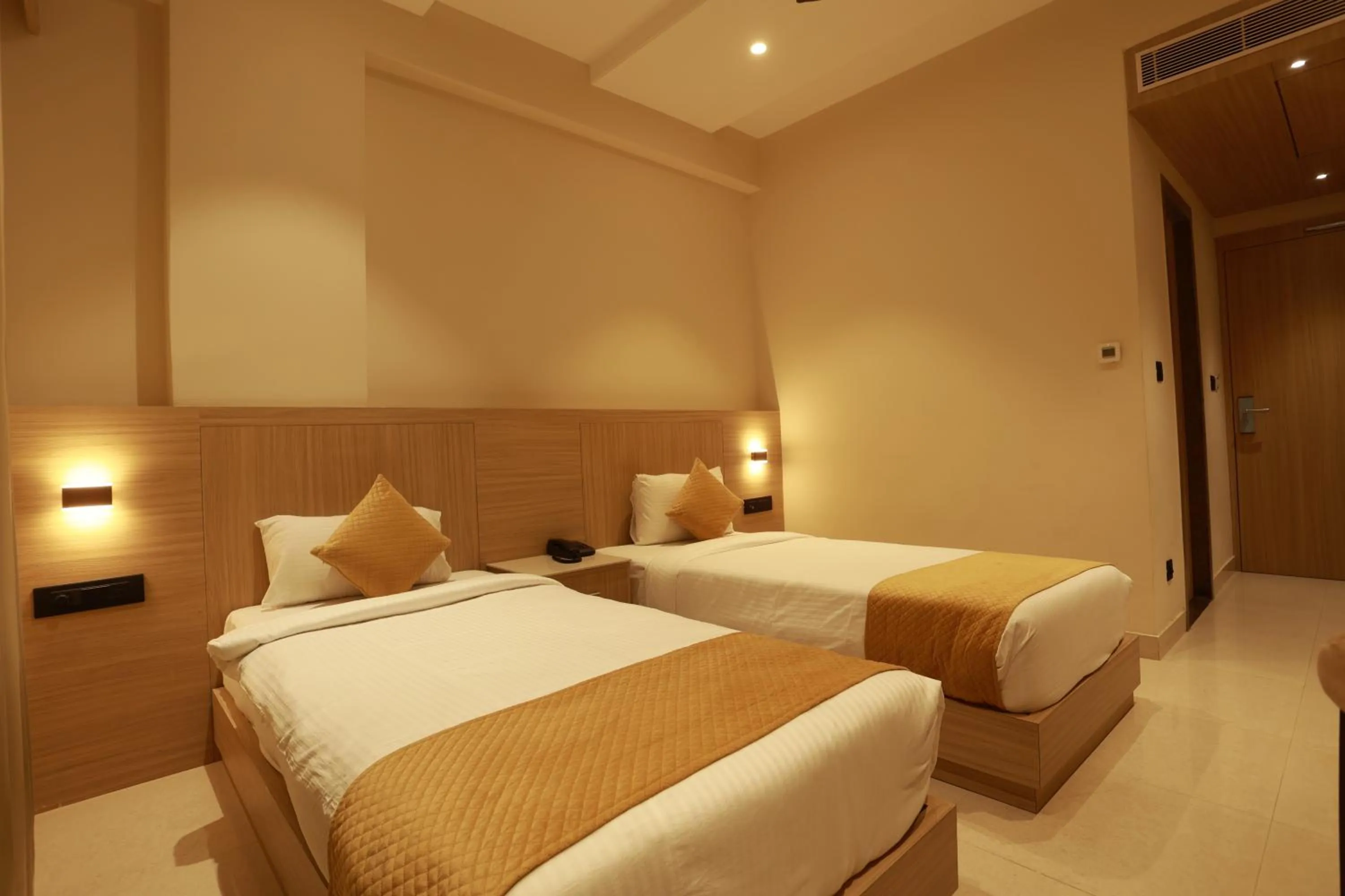 Bed in Hotel Taviral Regency
