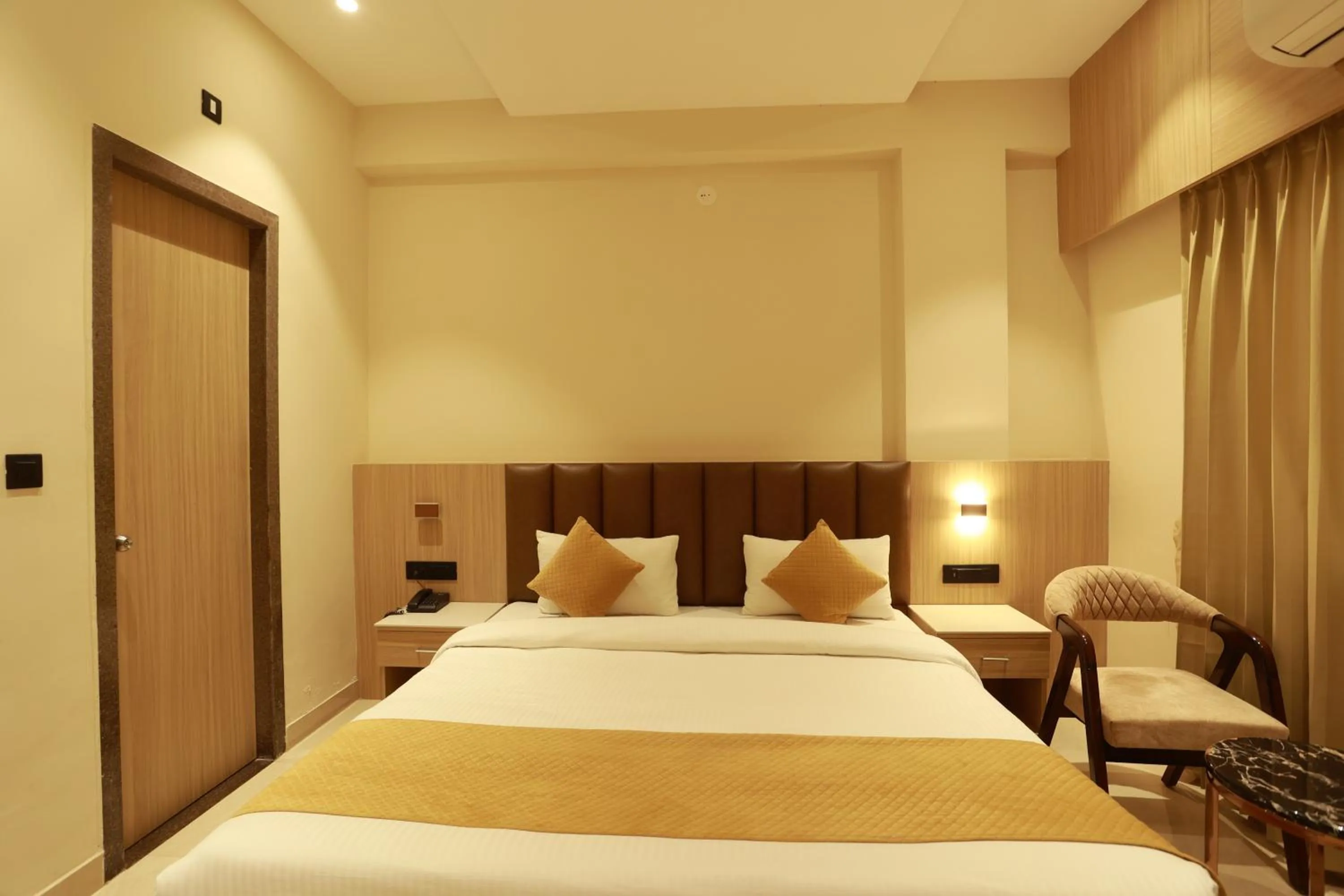 Bed in Hotel Taviral Regency