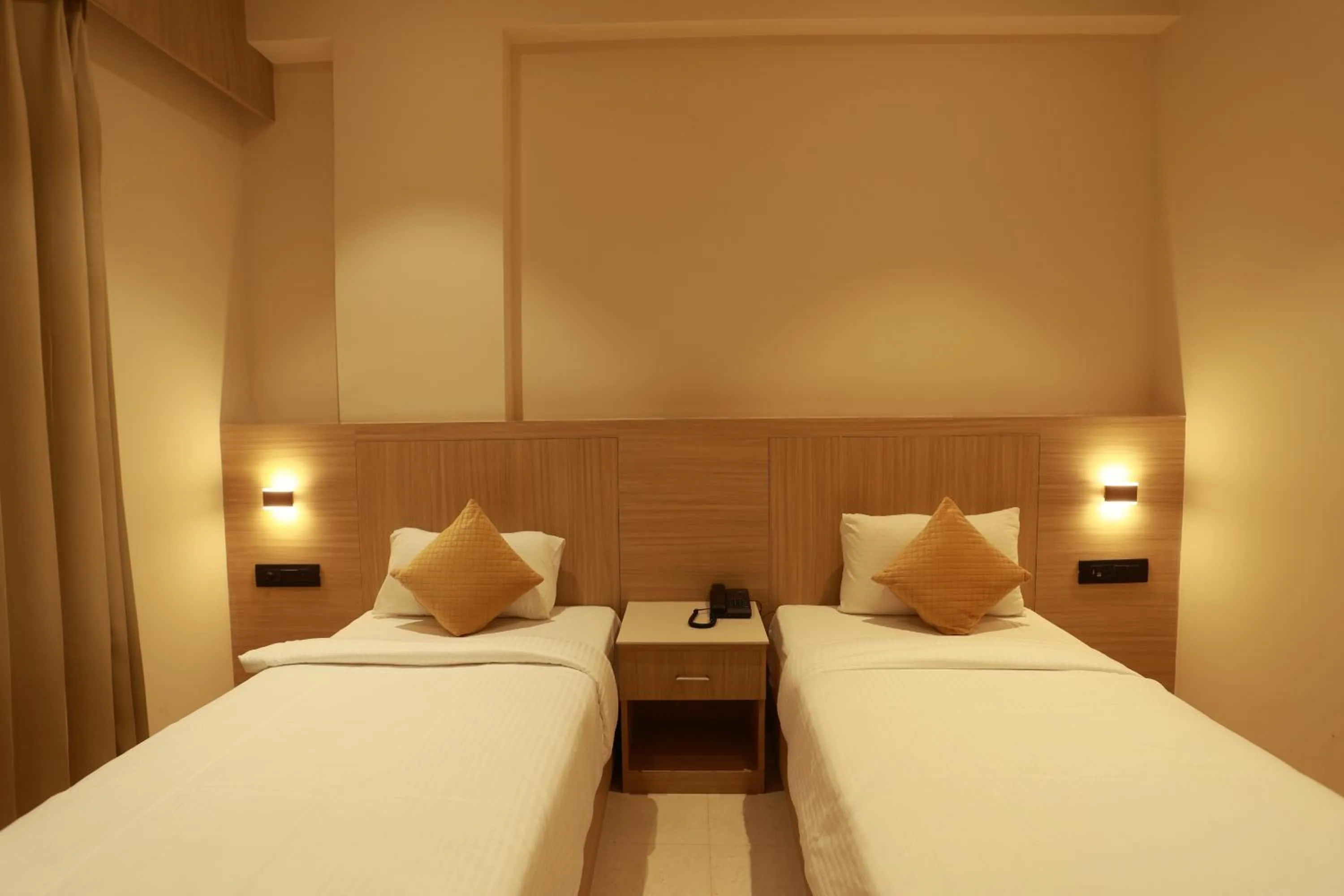 Bed in Hotel Taviral Regency