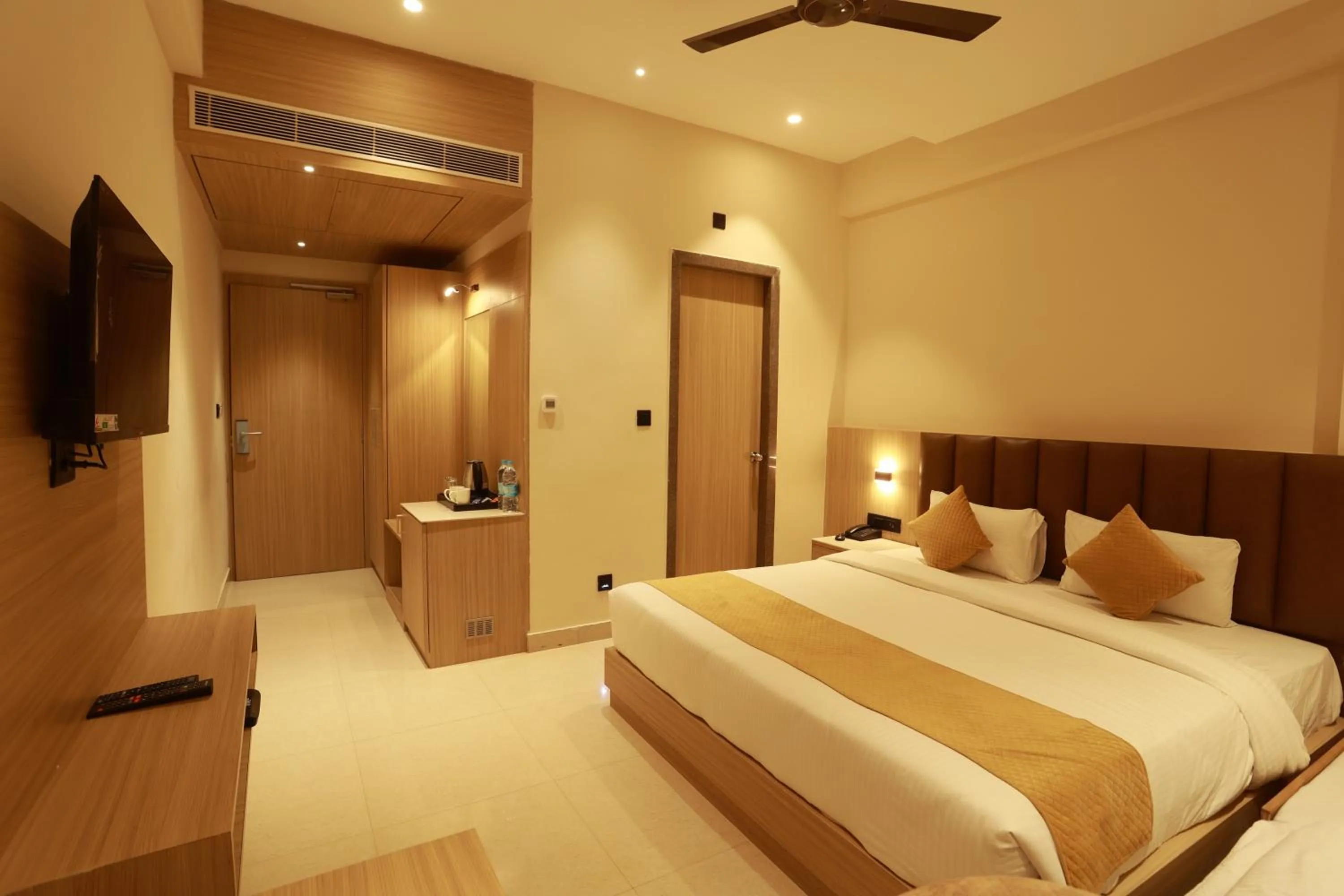 Bed in Hotel Taviral Regency