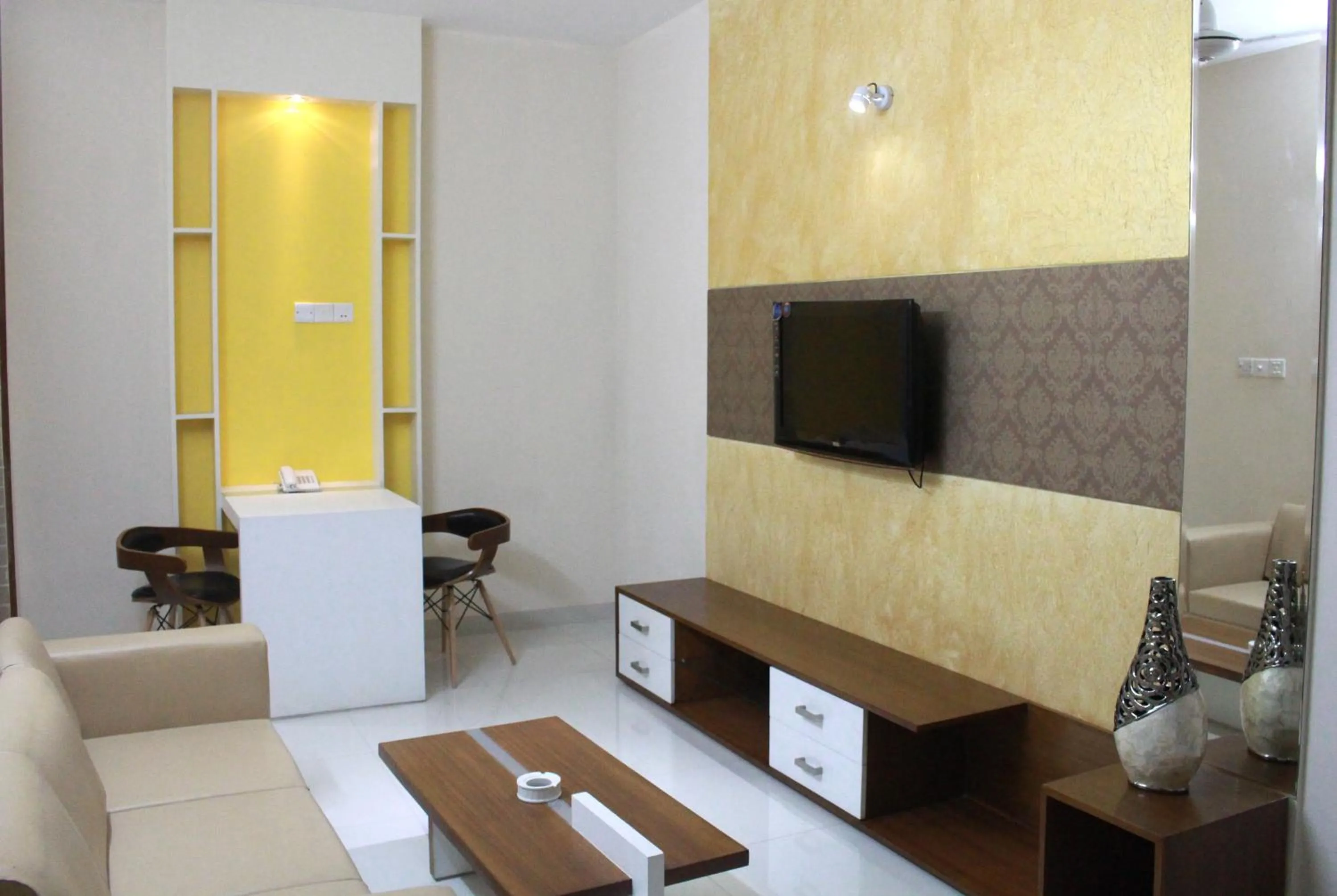 Photo of the whole room in NAAS Serviced Apartments