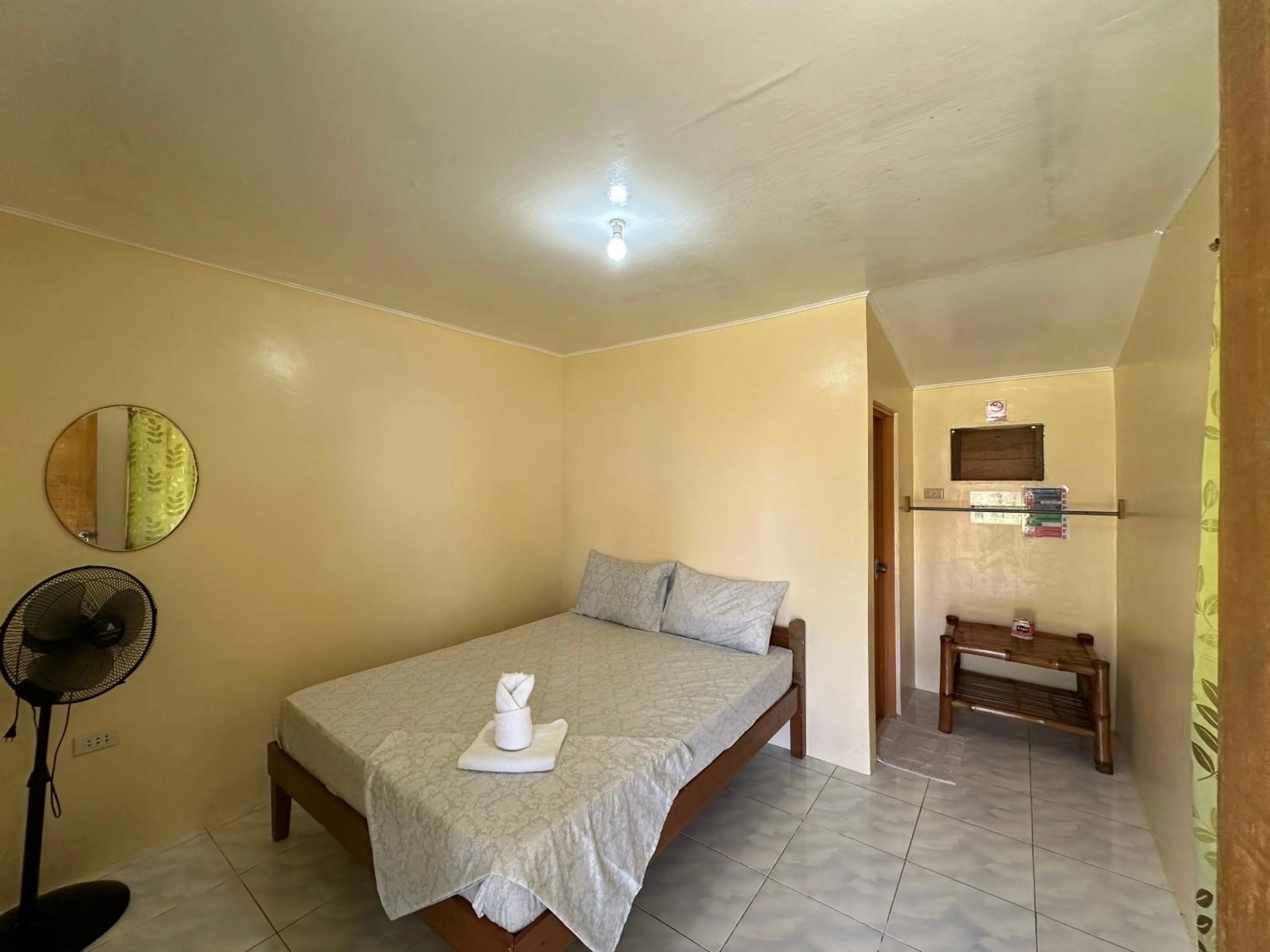 Bed in Dancalan Beach Resort