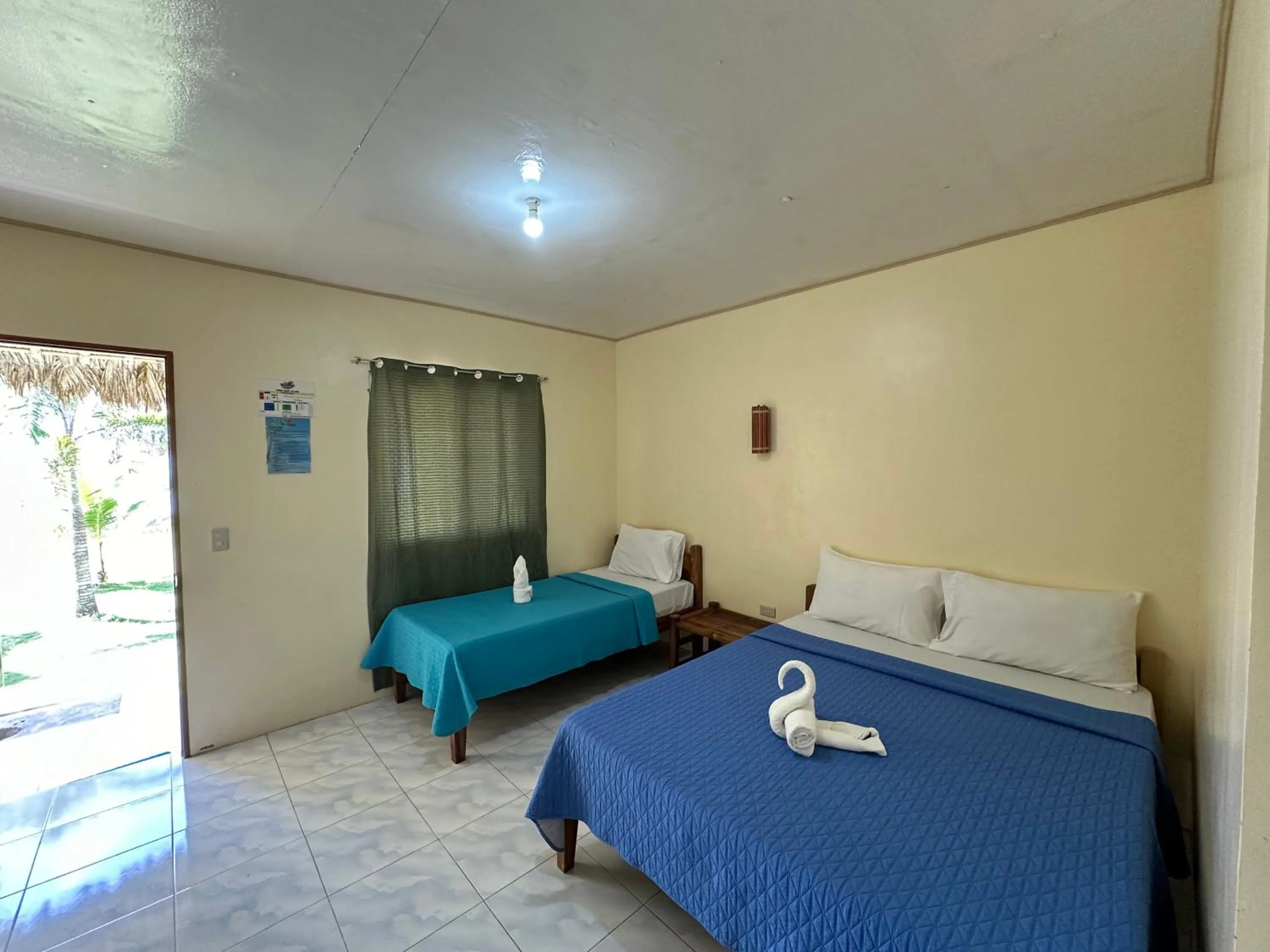 Bed in Dancalan Beach Resort