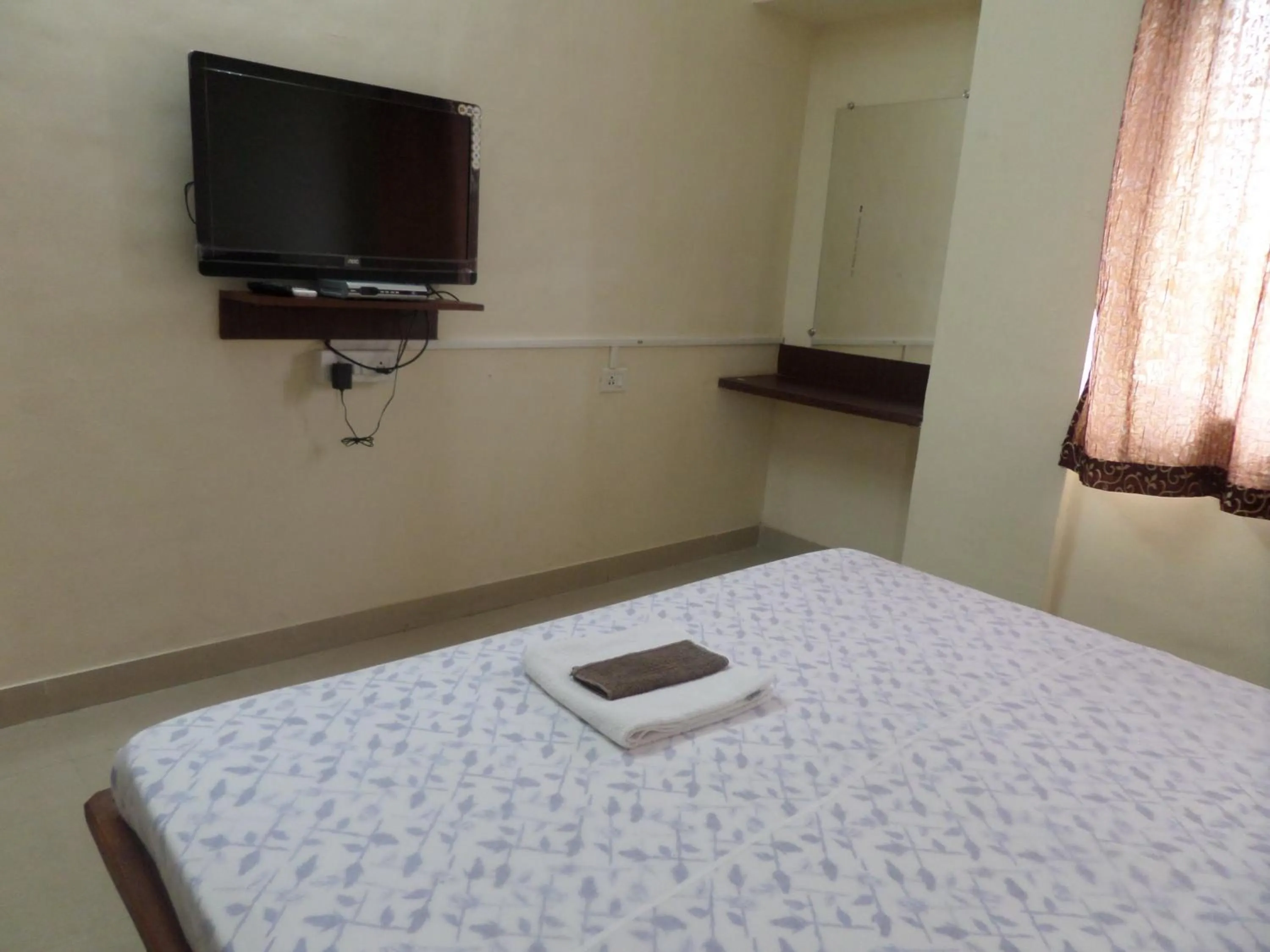 Bed in Cosmos Luxury Vimannagar