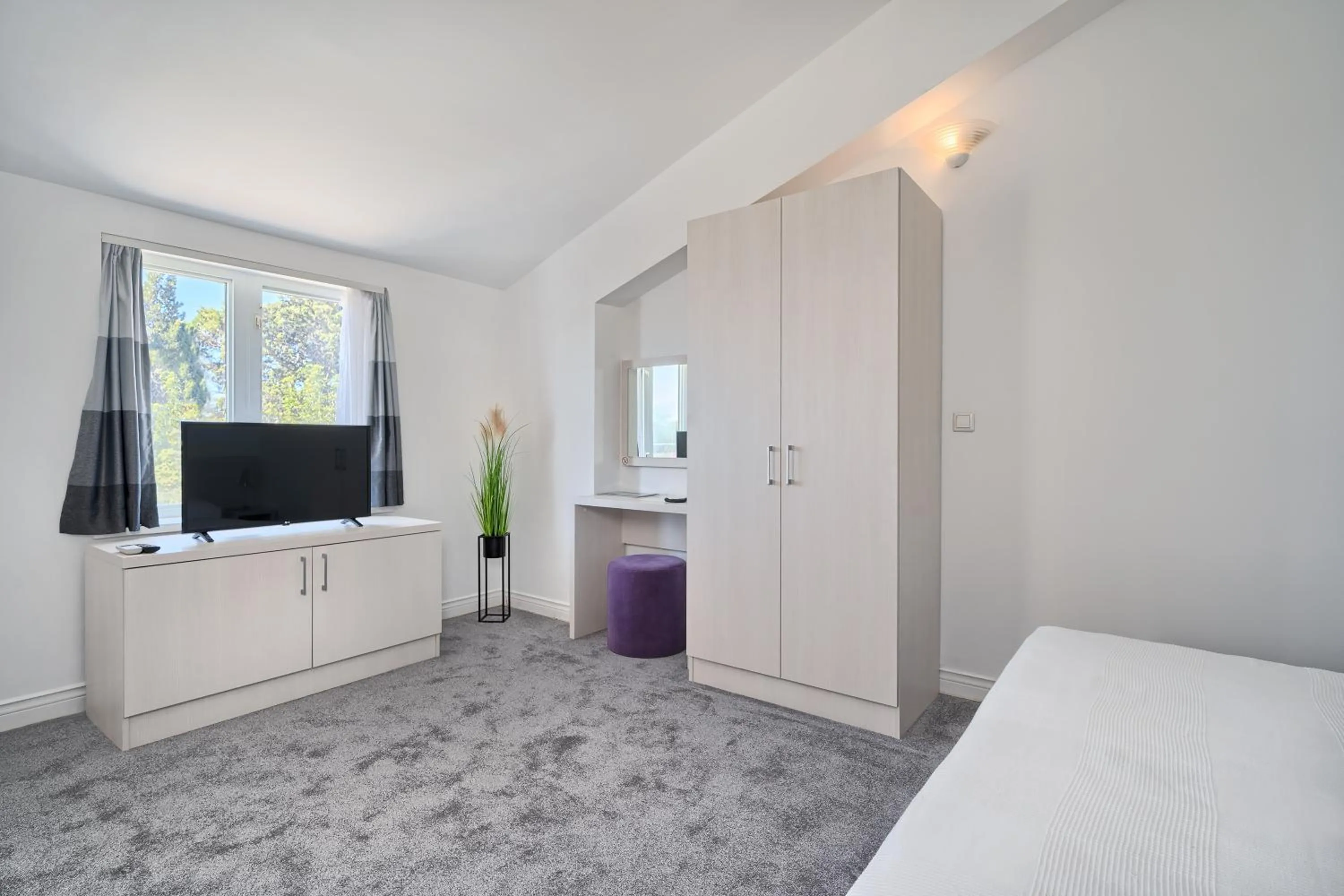 TV and multimedia in Hotel Aqua - Guest Rooms & Suites Kaštela