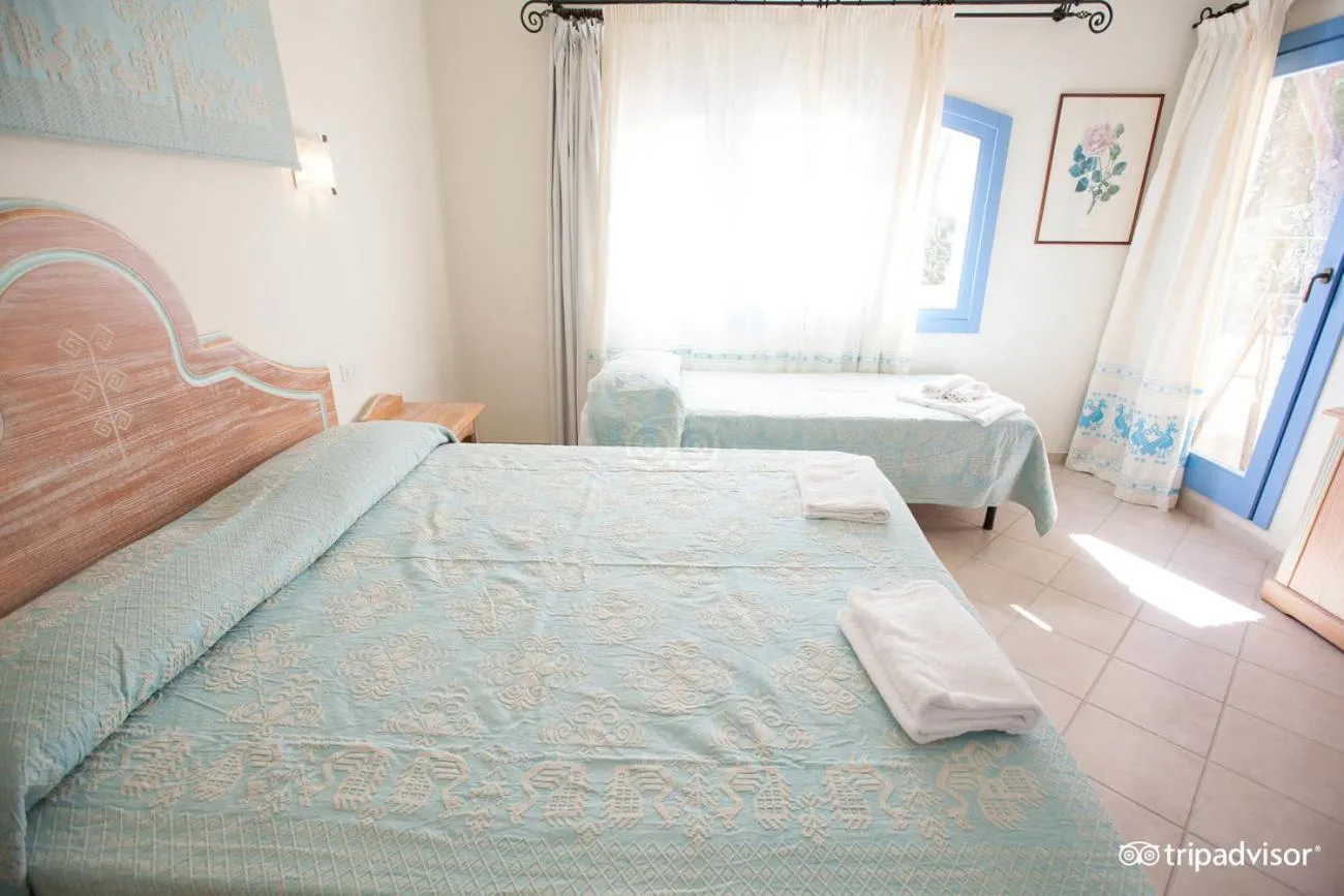 Bed in Colostrai Hotel Club