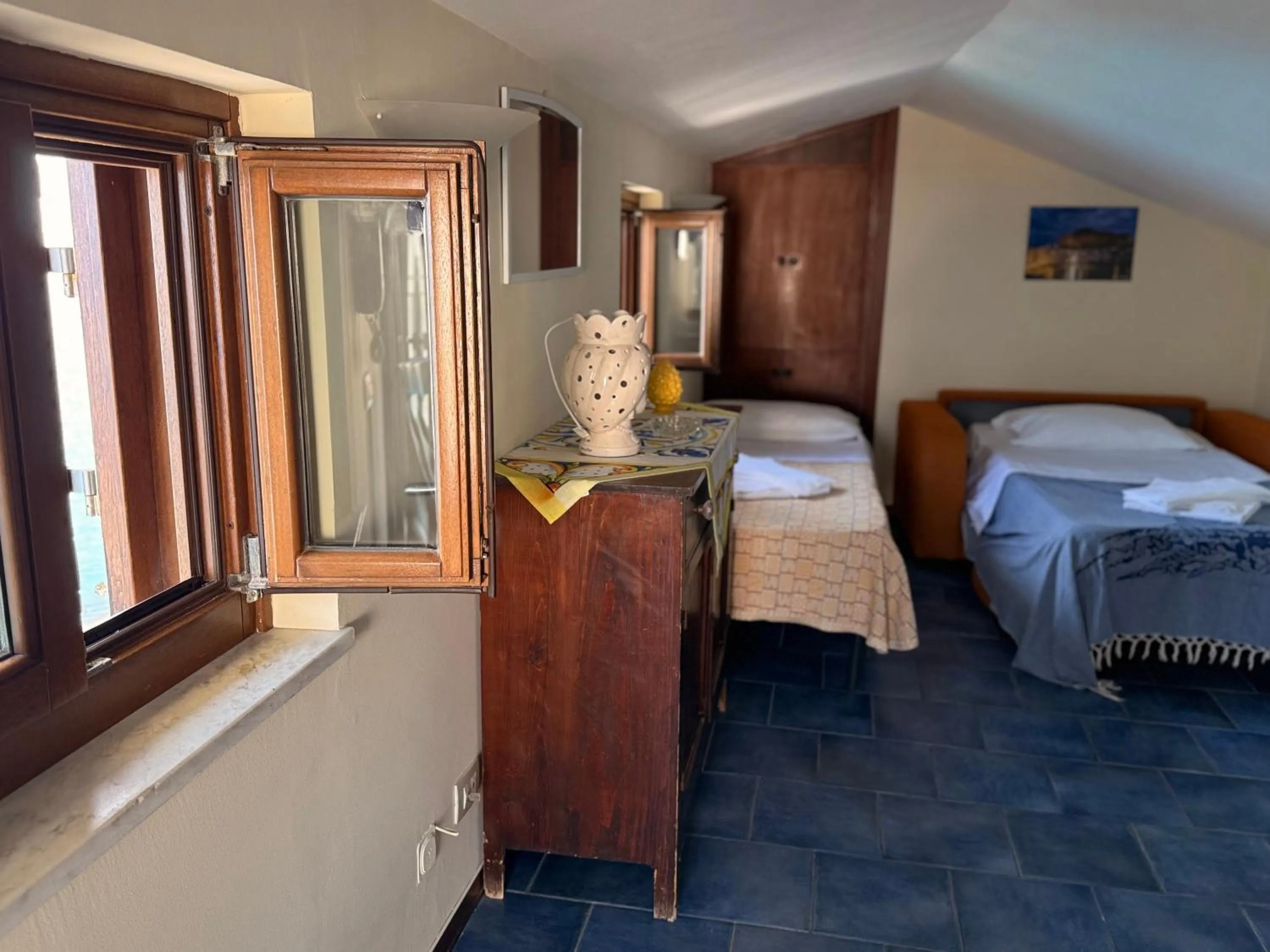 Photo of the whole room, Bed in MiraMare Residence Cefalú