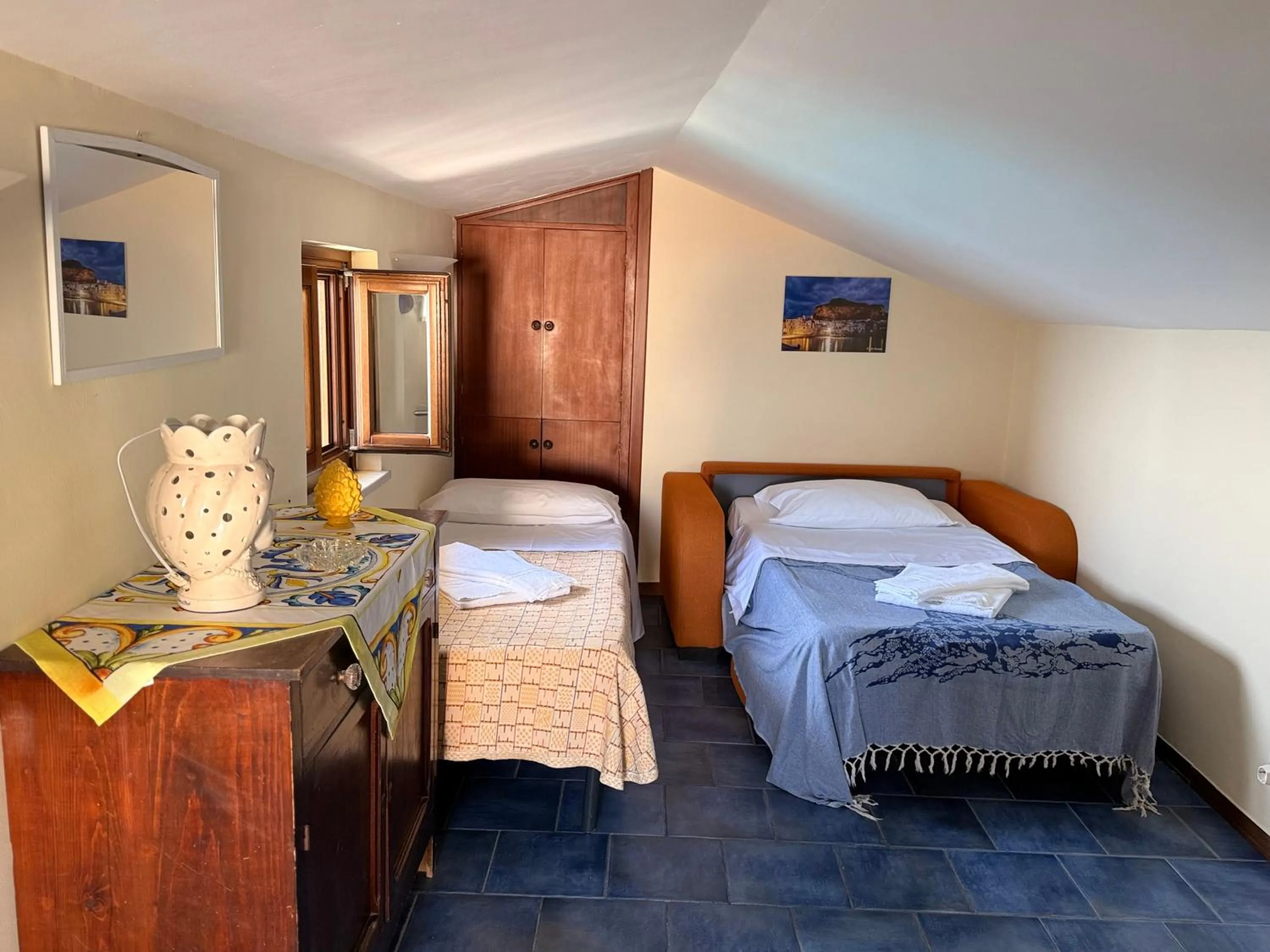 Photo of the whole room, Bed in MiraMare Residence Cefalú