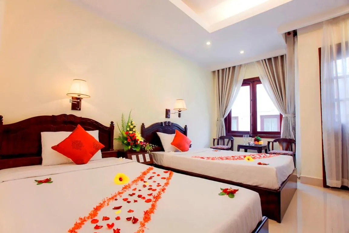 Bed in GM Doc Let Beach Resort & Spa