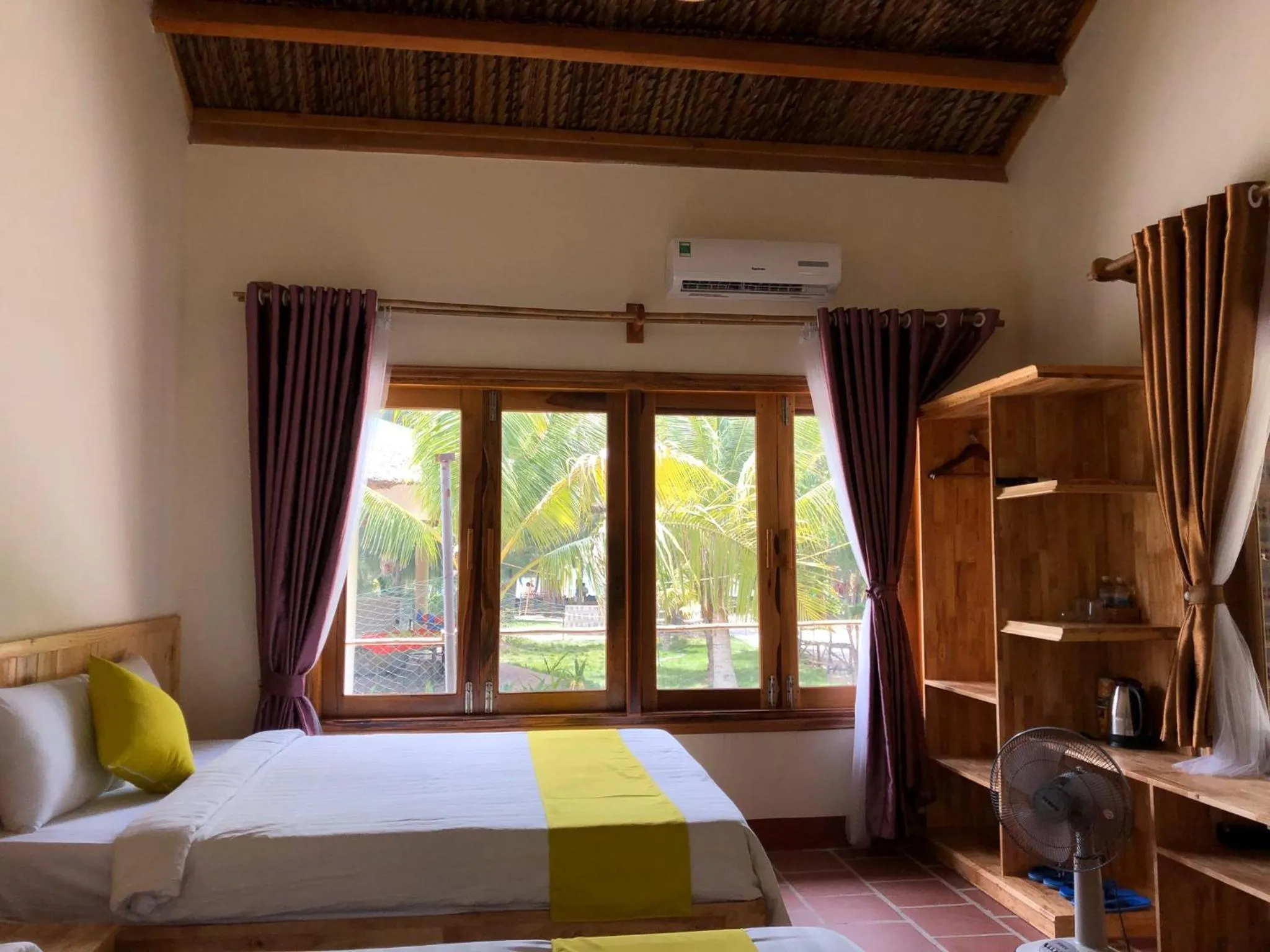 Bed in GM Doc Let Beach Resort & Spa