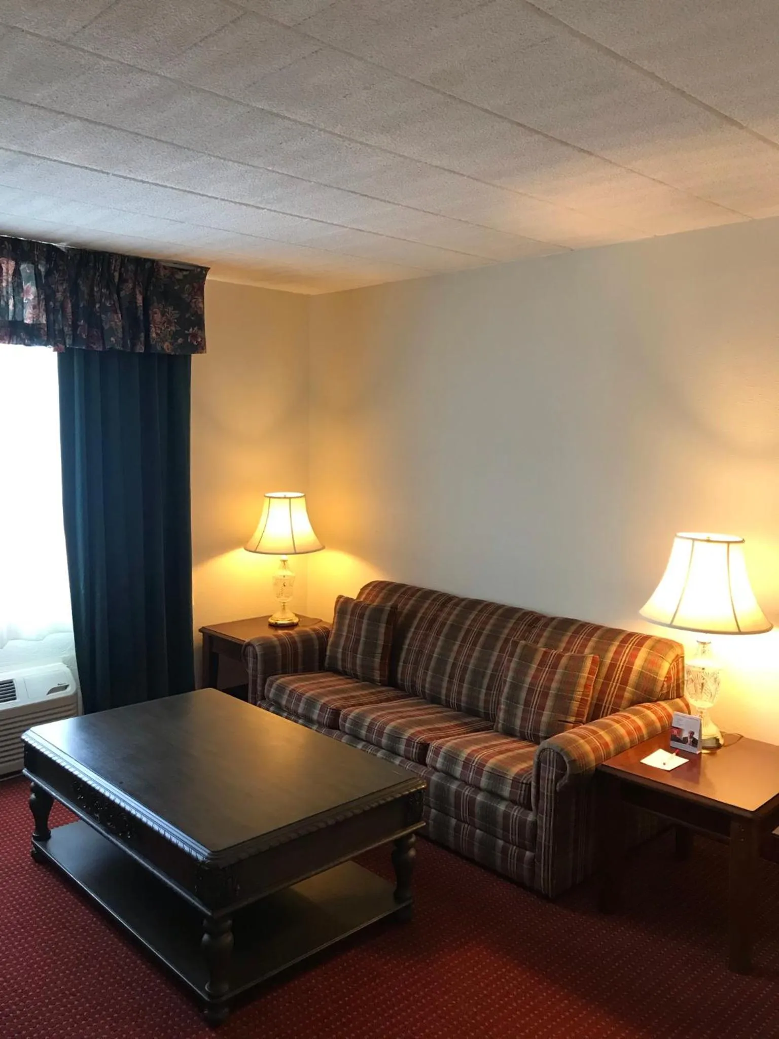 Living room in Ramada by Wyndham Ligonier