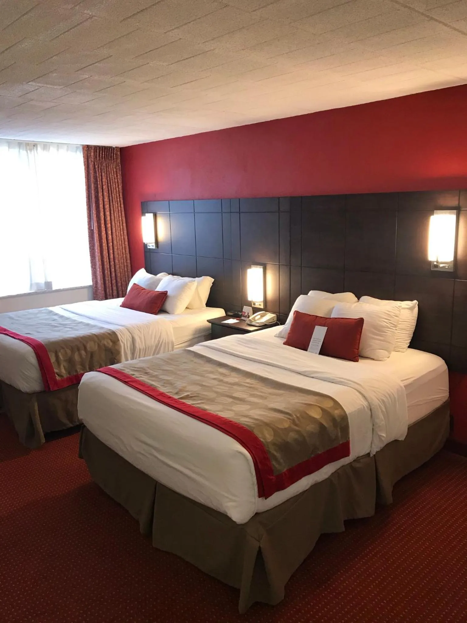 Bedroom, Bed in Ramada by Wyndham Ligonier