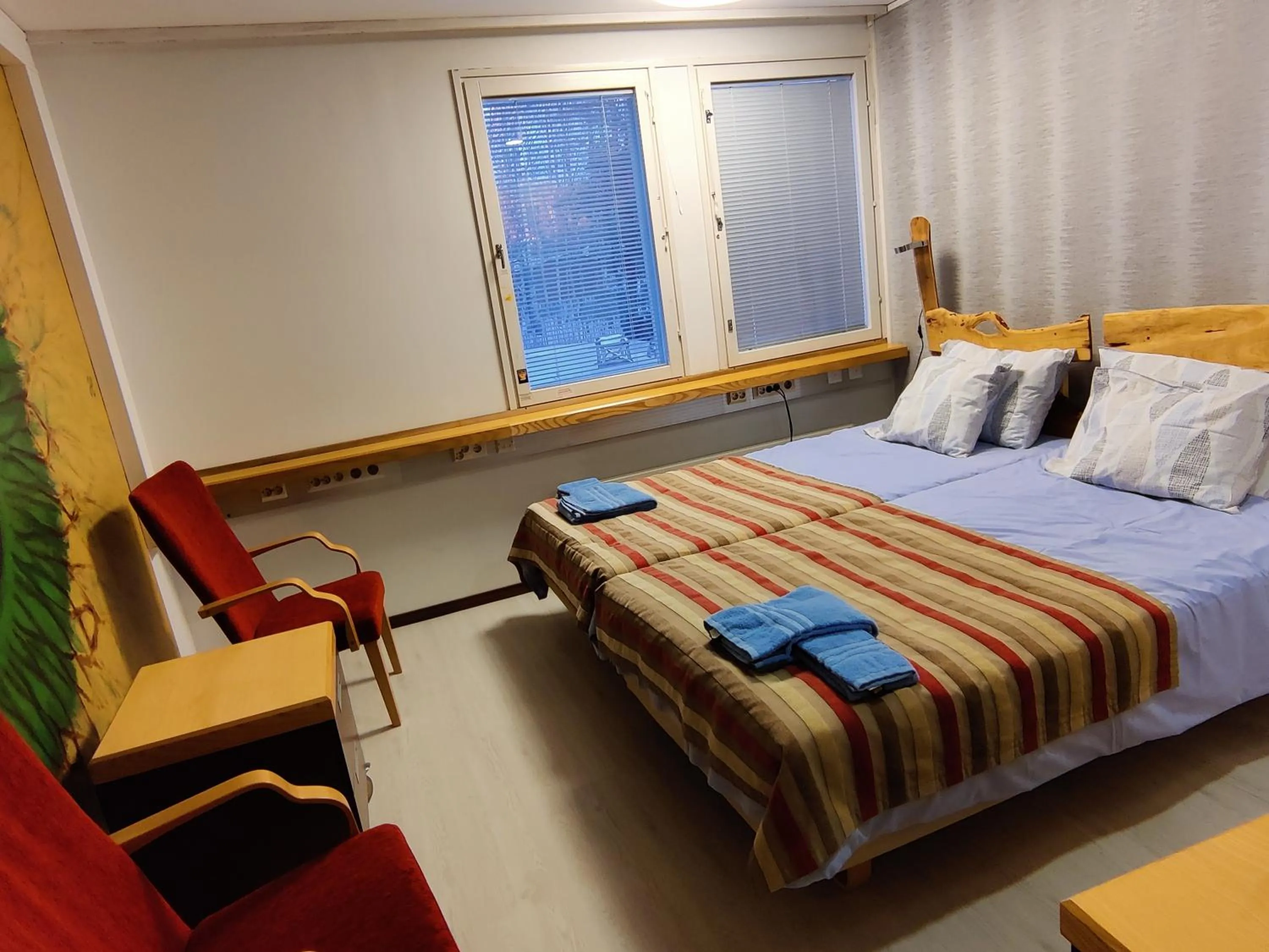 Bed in Jaala Hotel Guesthouse